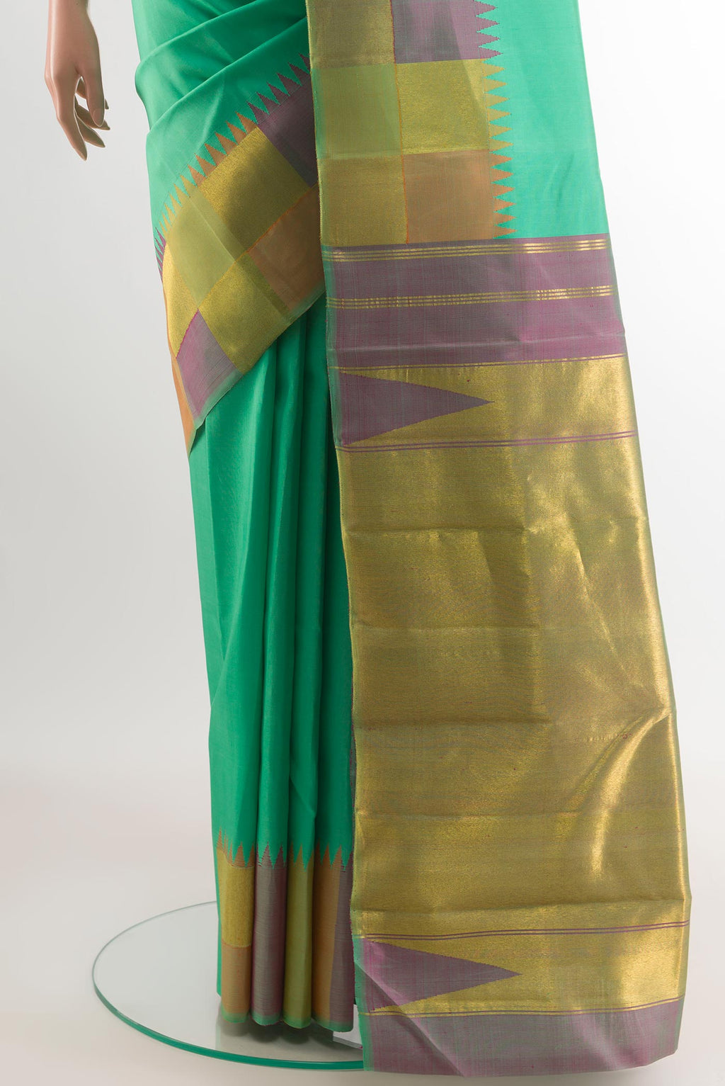 Pleats and pallu of Sea Green Kanjivaram Silk Saree with Plain Body and Zari Border. 