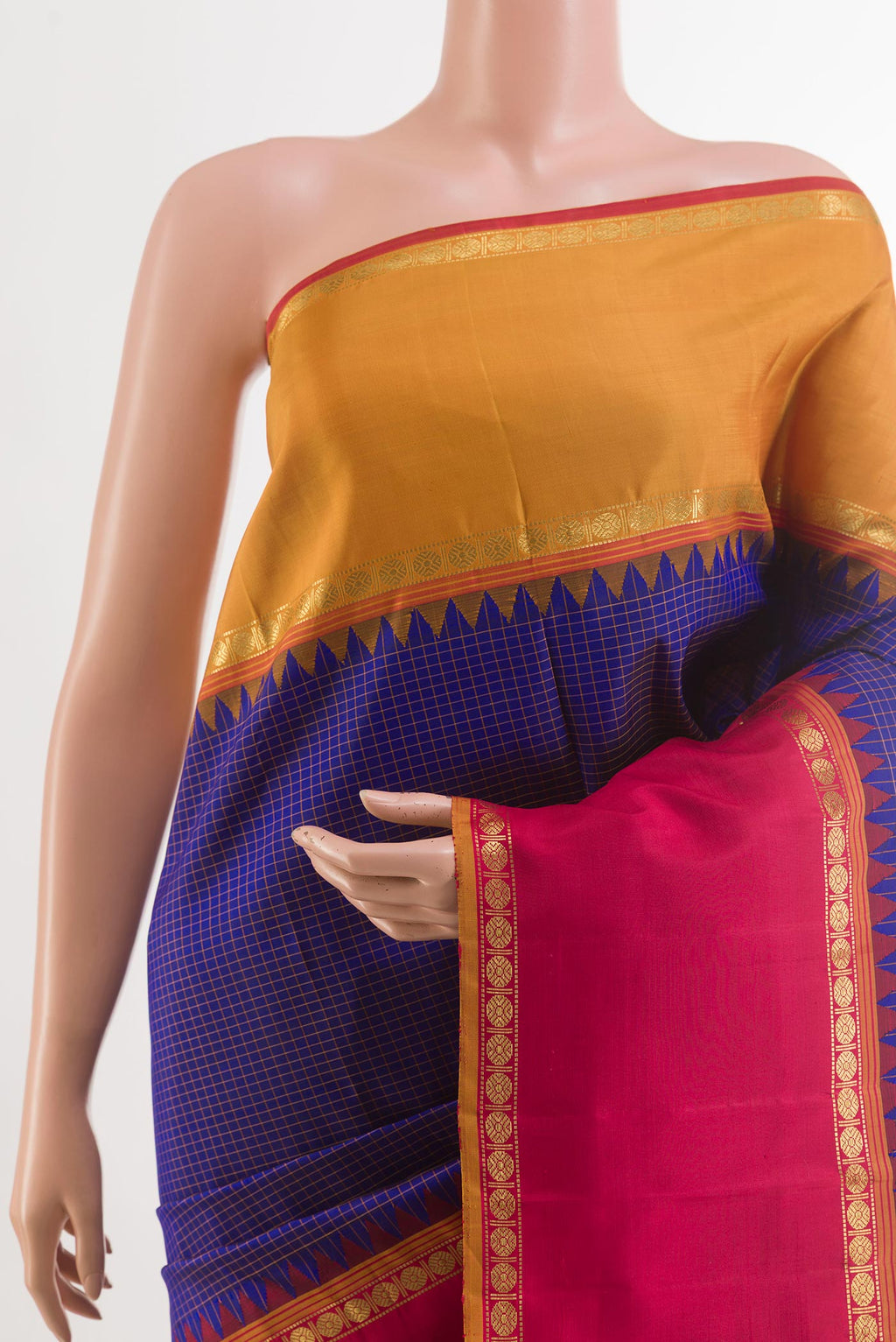 Border image of Blue Kanchipuram Silk Saree with Checked design on the body and Ganga Jamuna Border. 