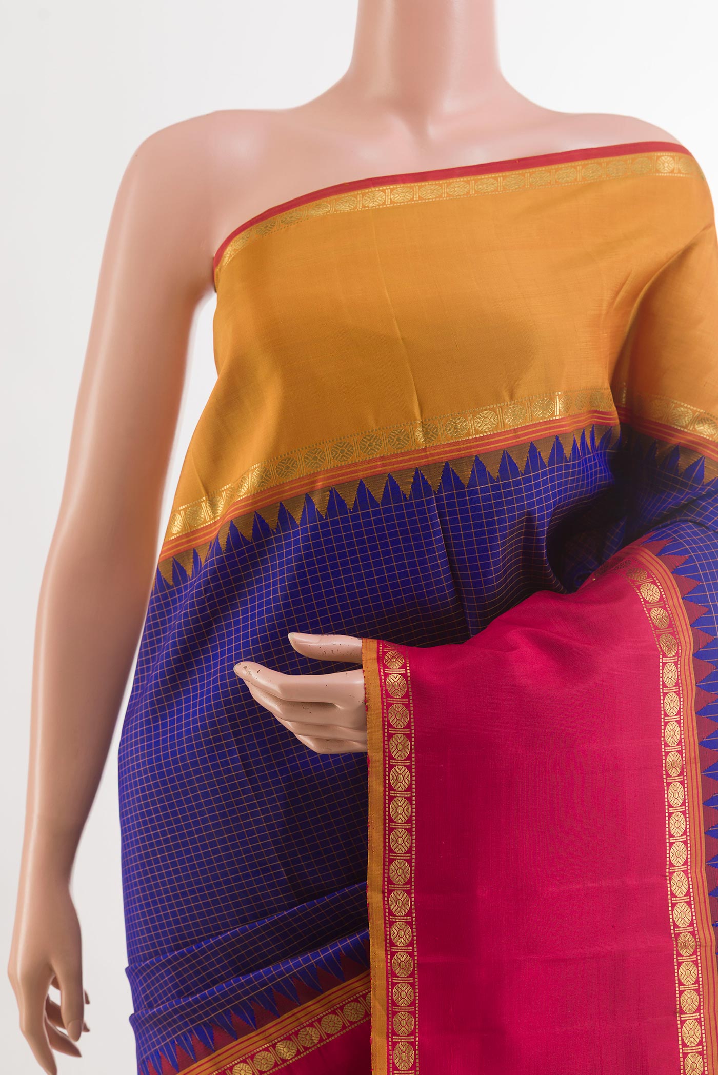 Border image of Blue Kanchipuram Silk Saree with Checked design on the body and Ganga Jamuna Border. 