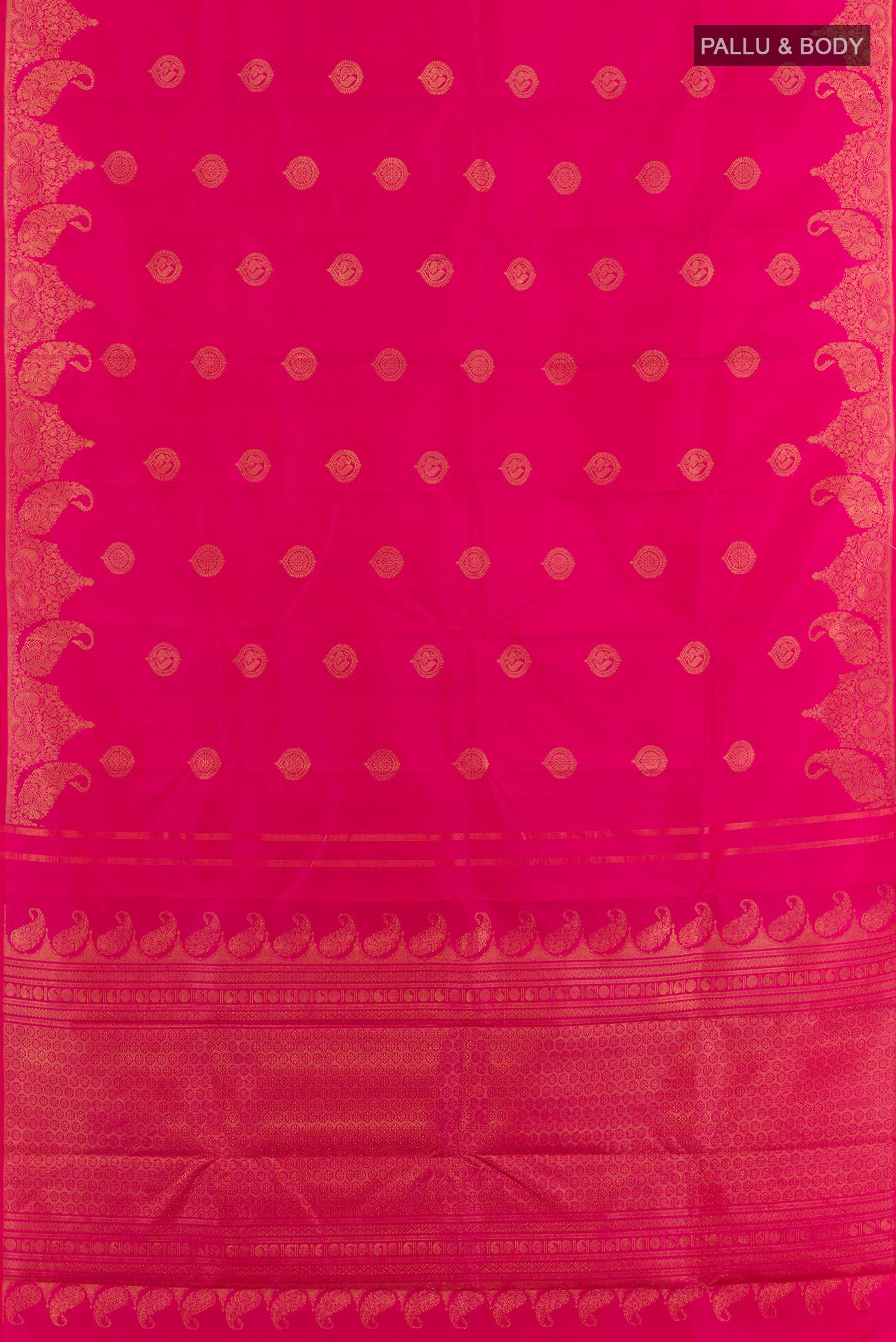 Flat view of Pink Kanchipuram Silk Saree with Zari Butta on the body and Zari Border. 