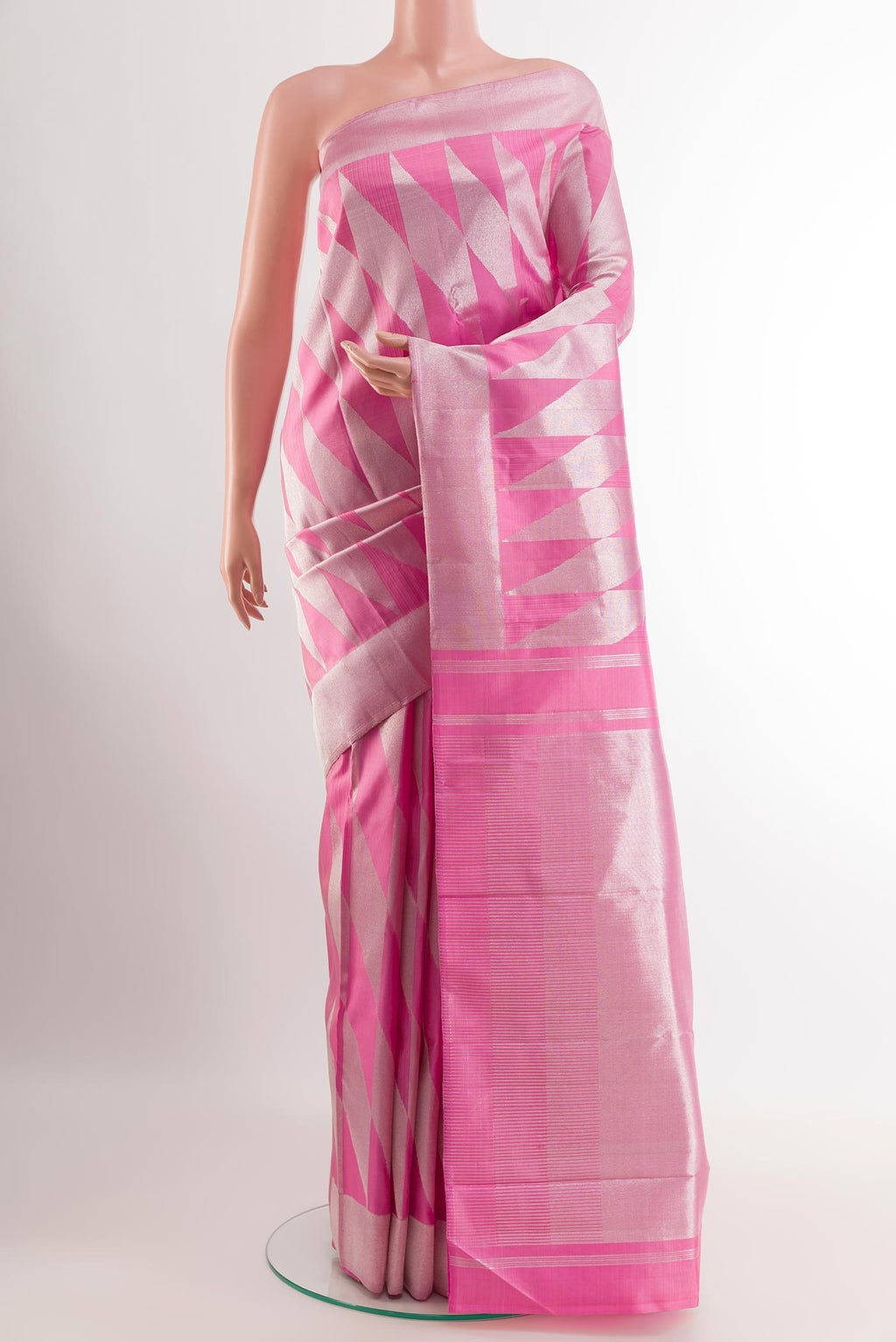 Pink Kanchipuram Silk Saree with Zari Brocade on the body and Zari Border.  displayed on a mannequin