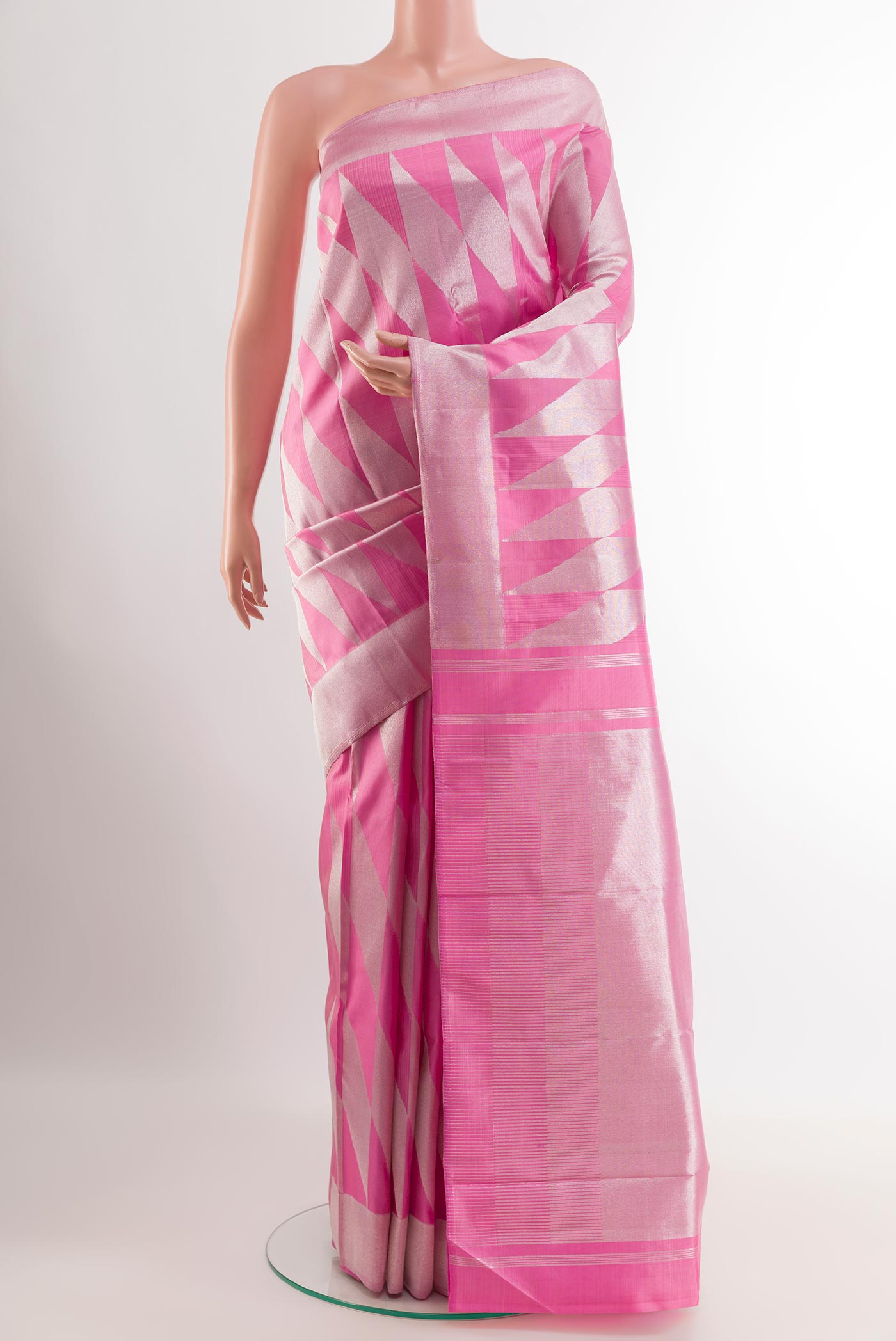 Pink Kanchipuram Silk Saree with Zari Brocade on the body and Zari Border.  displayed on a mannequin