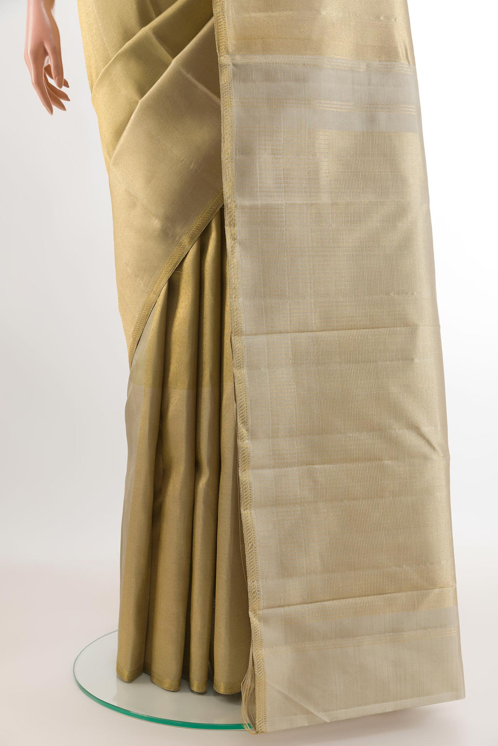 Pleats and pallu of Golden Kanchipuram Silk Saree with Zari Brocade on the body and Zari Border. 