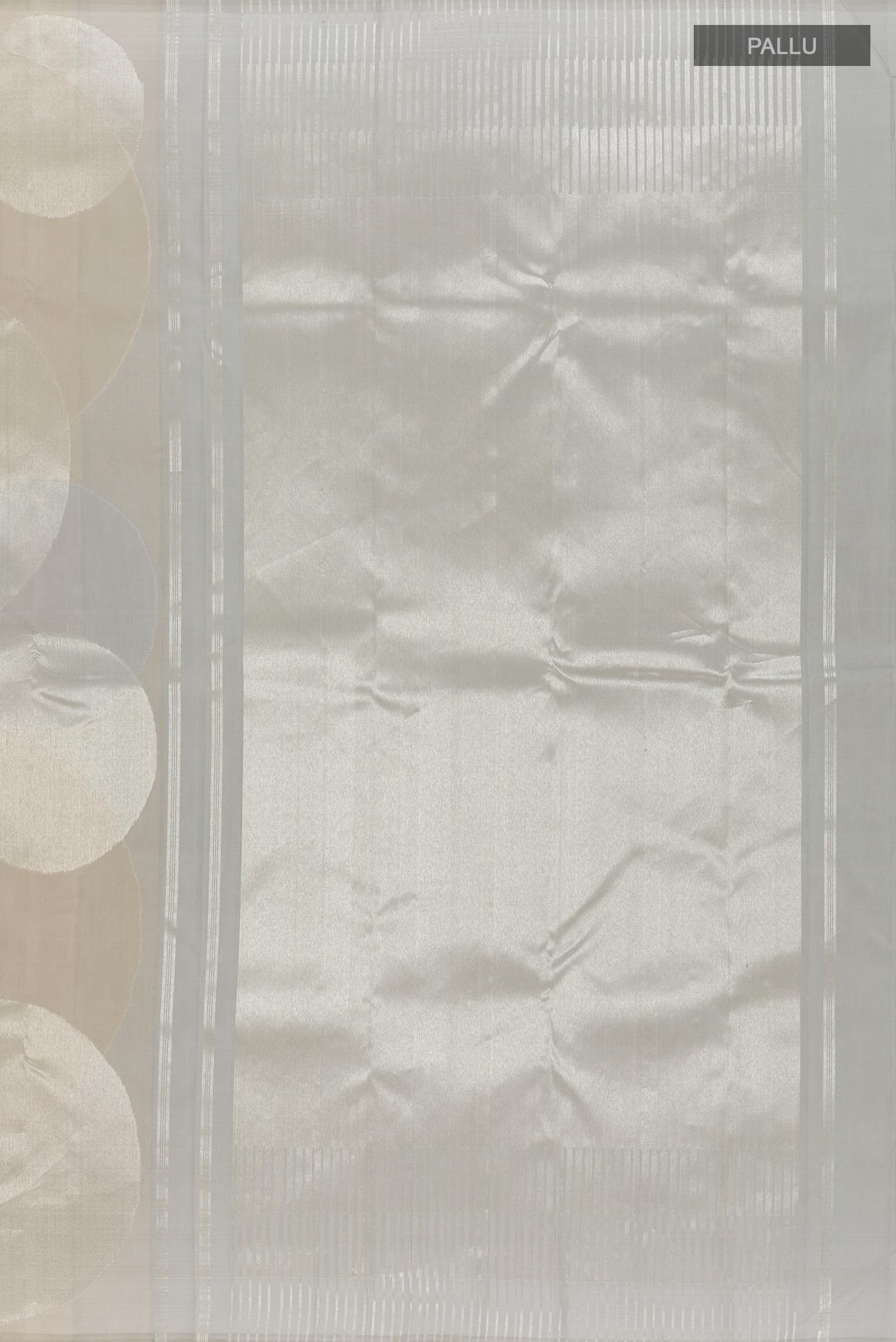 Close up image of the pallu of Silver Kanjivaram Silk Saree with Zari Brocade on the body and Zari Border. 