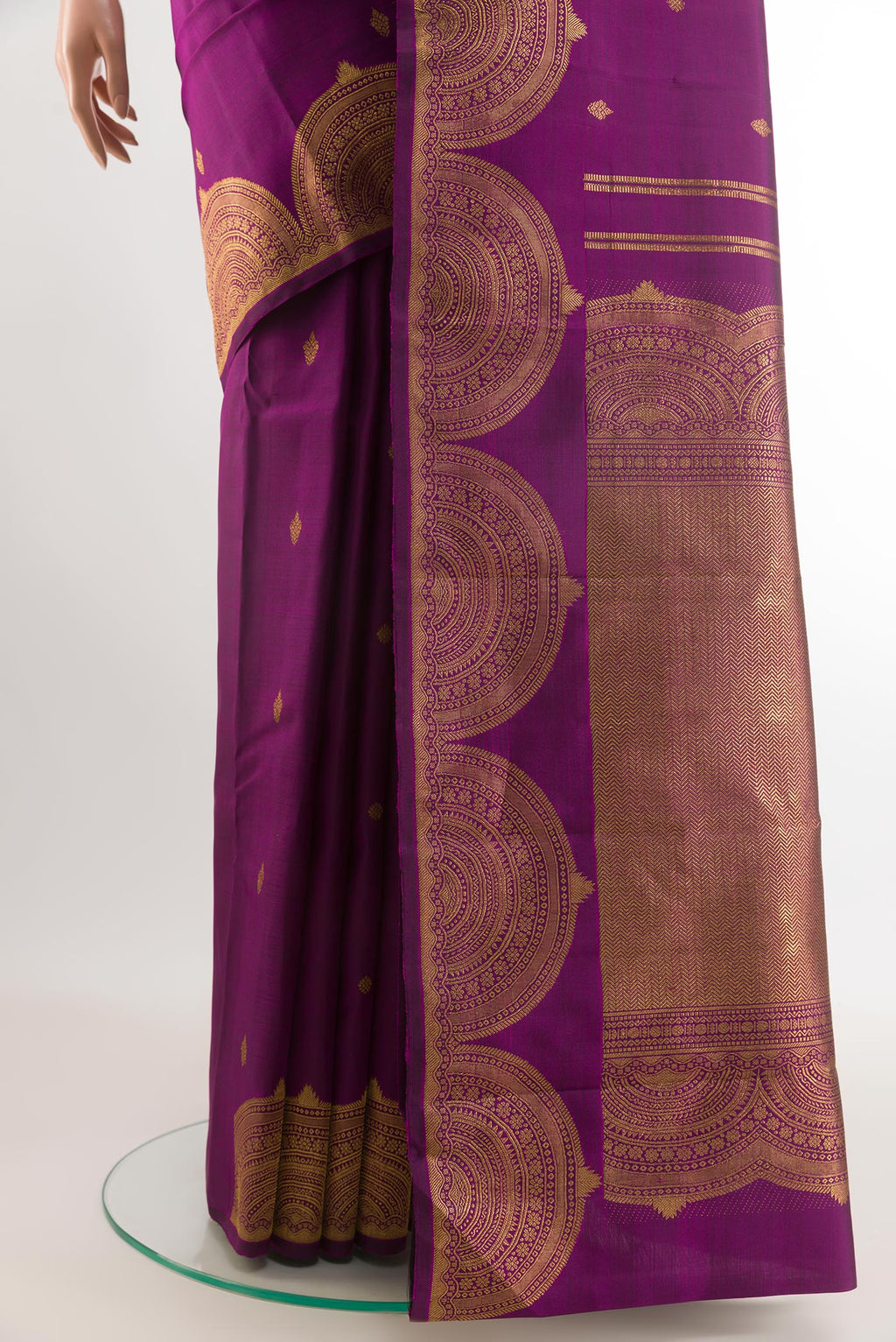 Pleats and pallu of Purple Kanjivaram Silk Saree with Zari Butta on the body and Zari Border. 