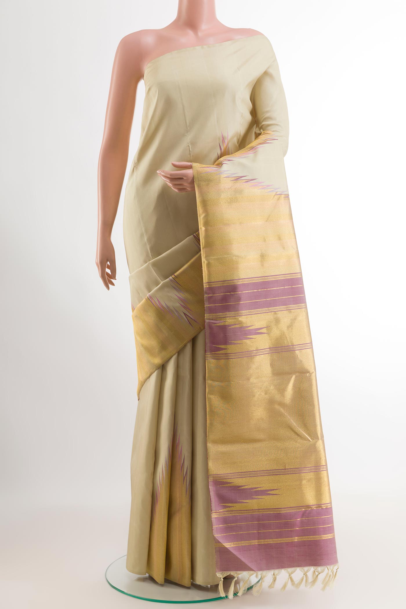 Cream Kanchipuram Silk Saree with Plain Body and Rising Temple Border.  displayed on a mannequin