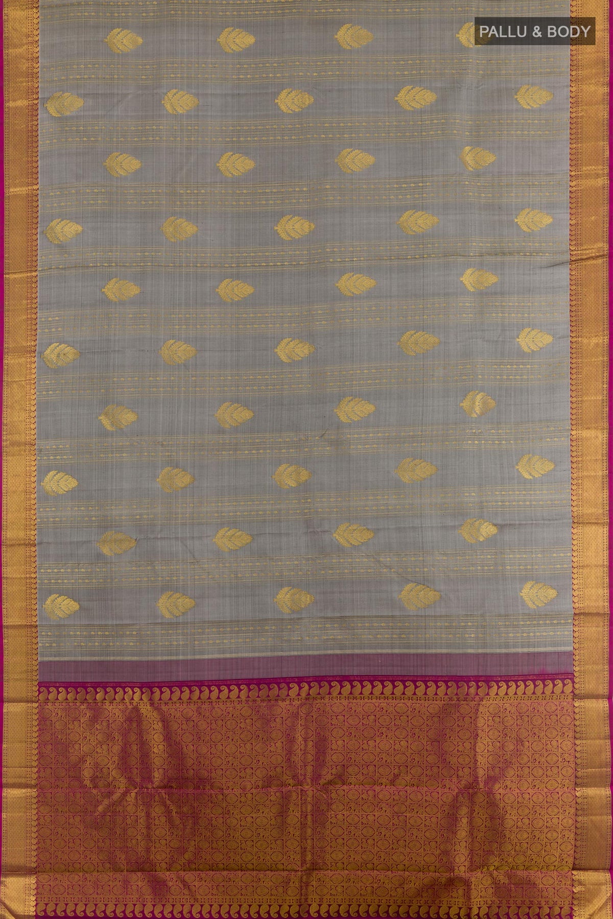 Flat view of Grey Kanjivaram Silk Saree with Zari Butta on the body and Zari Border. 