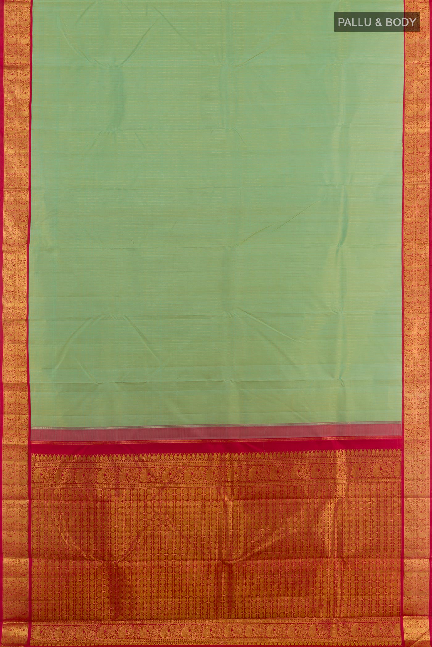 Flat view of Mint Green Kanjivaram Silk Saree with Zari Butta on the body and Zari Border. 