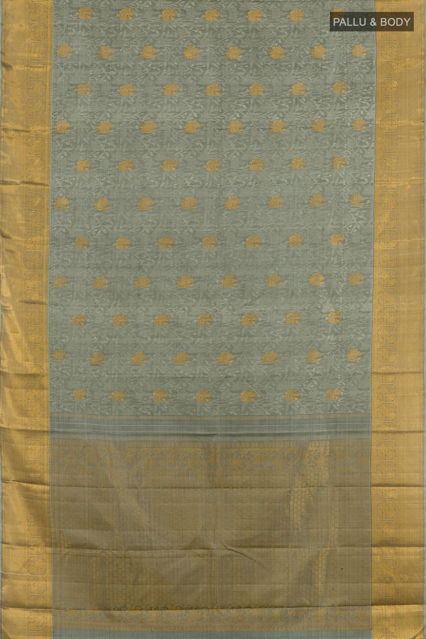 Flat view of Grey Kanjivaram Silk Saree with Jacquard With Zari Butta on the body and Zari Border. 