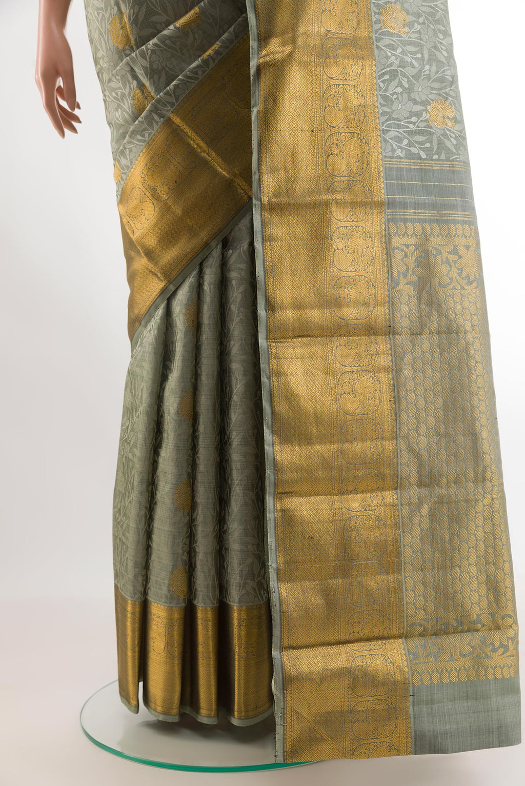 Pleats and pallu of Grey Kanjivaram Silk Saree with Jacquard With Zari Butta on the body and Zari Border. 