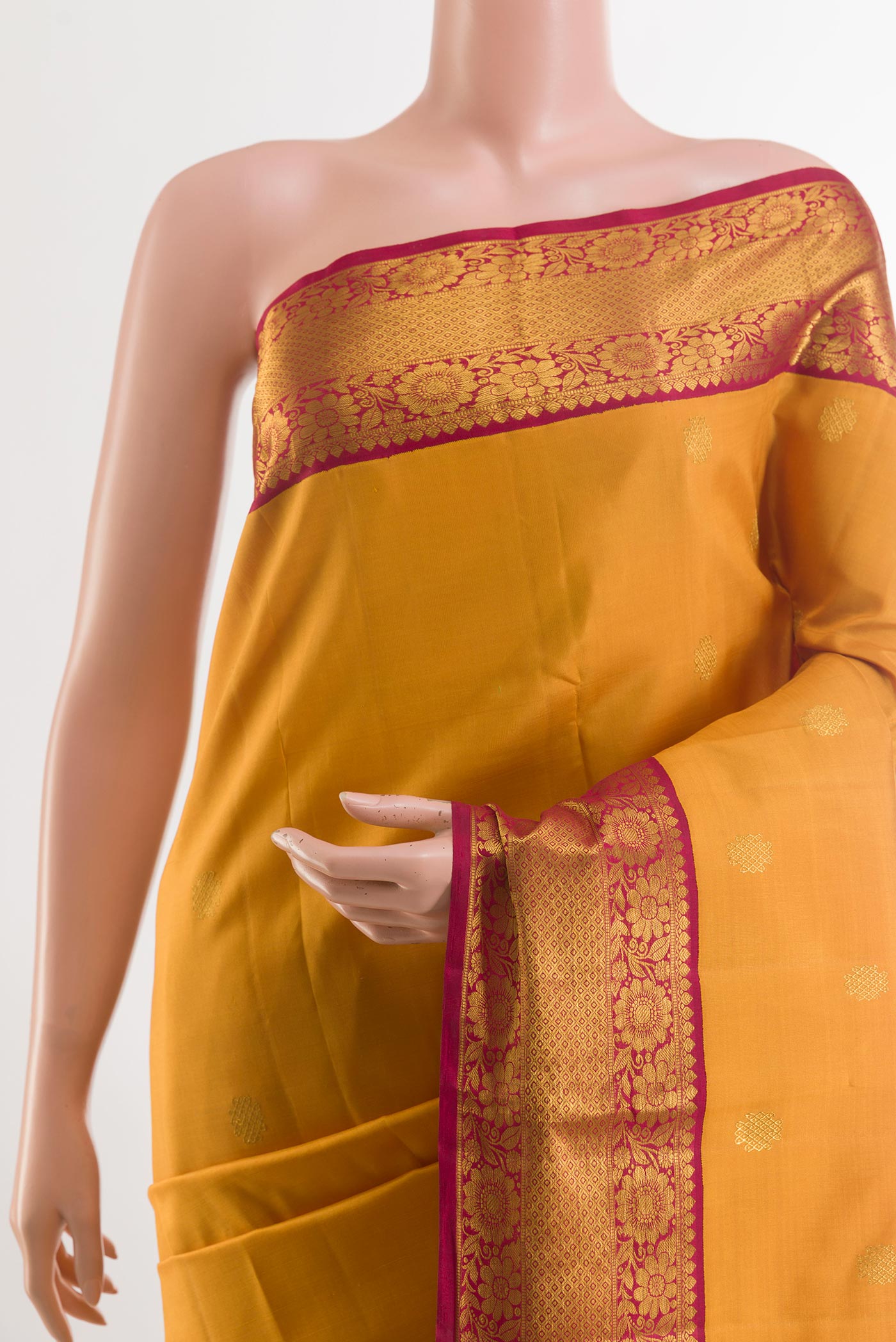 Border image of Mustard Kanjivaram Silk Saree with Zari Butta on the body and Zari Border. 
