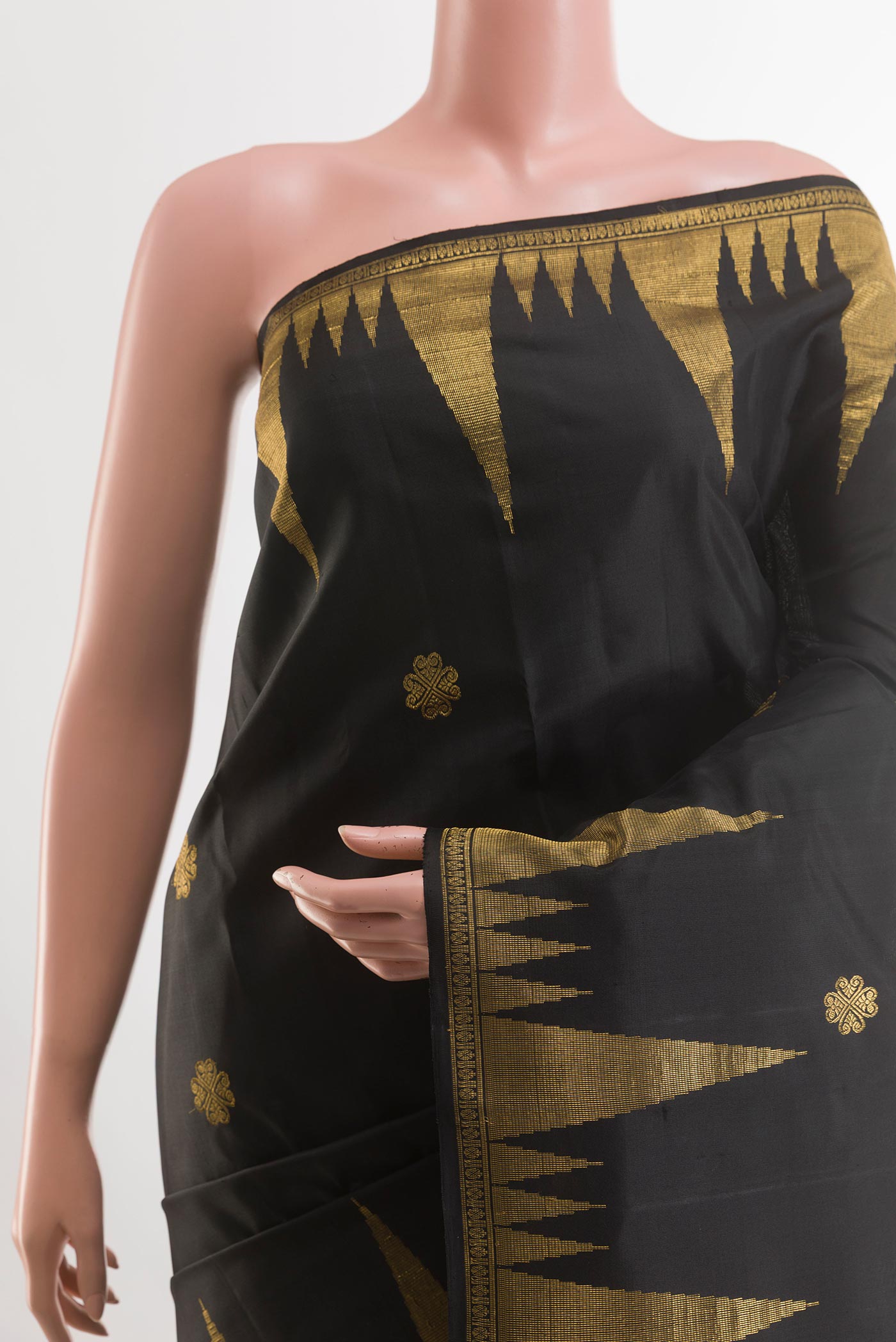 Border image of Black Kanjivaram Silk Saree with Zari Butta on the body and Zari Border. 