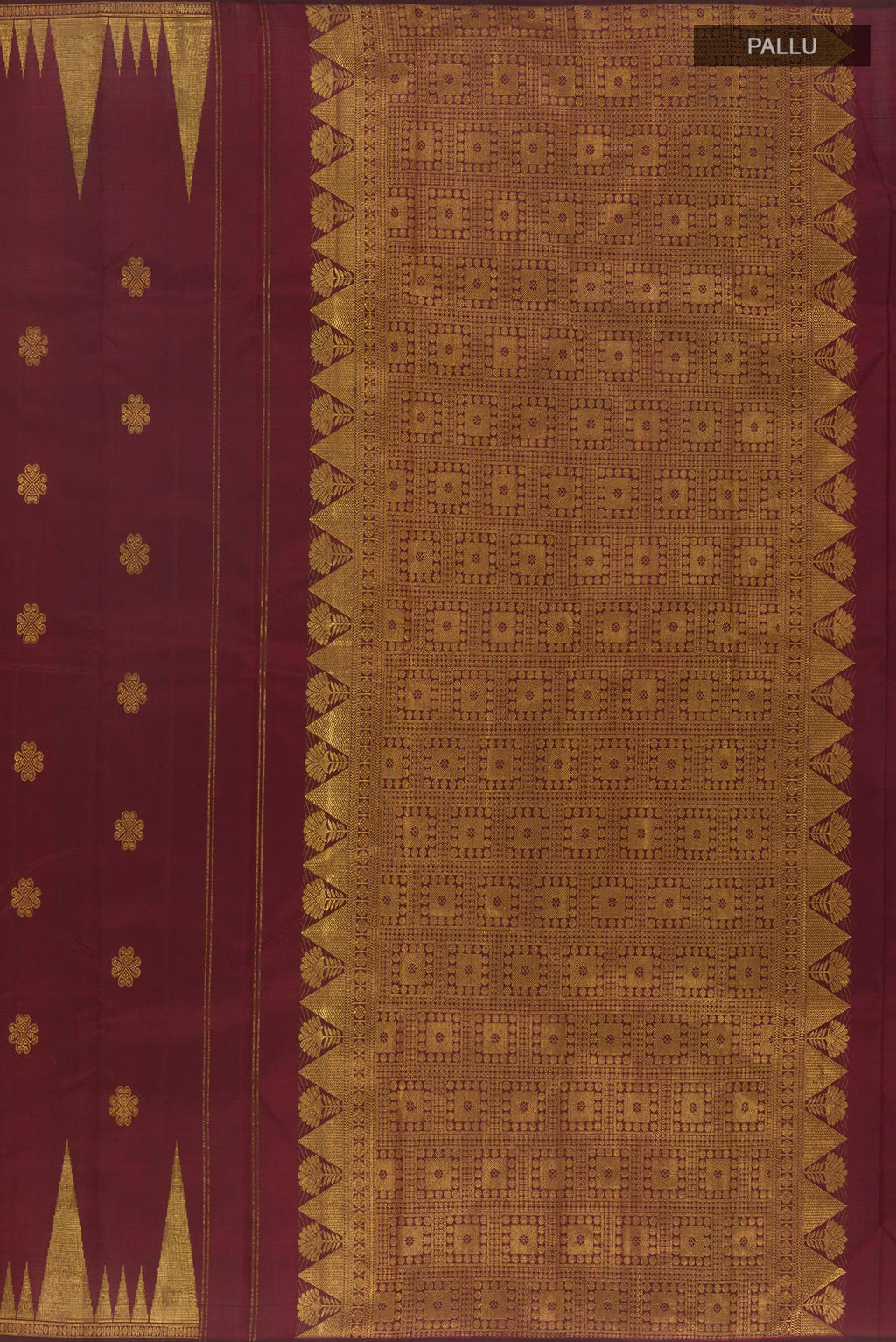 Close up image of the pallu of Maroon Kanjivaram Silk Saree with Zari Butta on the body and Zari Border. 