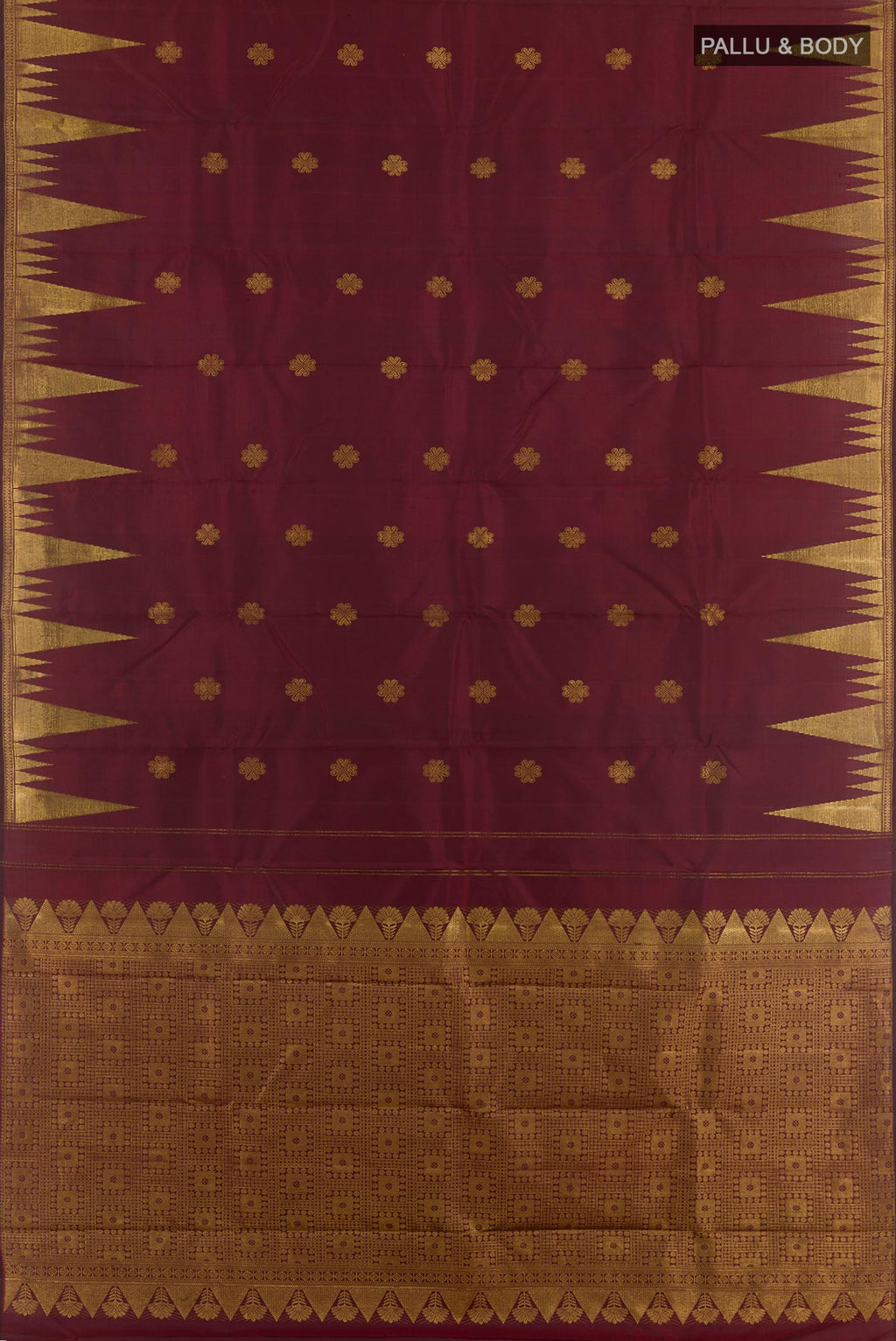 Flat view of Maroon Kanjivaram Silk Saree with Zari Butta on the body and Zari Border. 