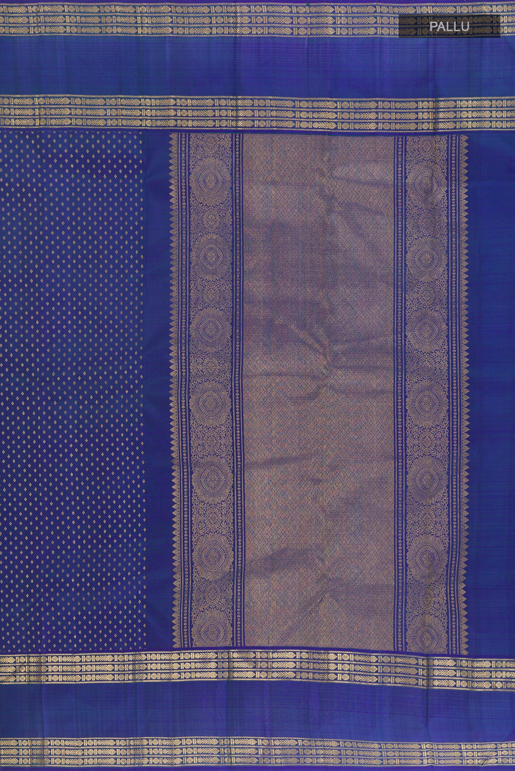 Close up image of the pallu of Blue Kanjivaram Silk Saree with Zari Butta on the body and Zari Border. 