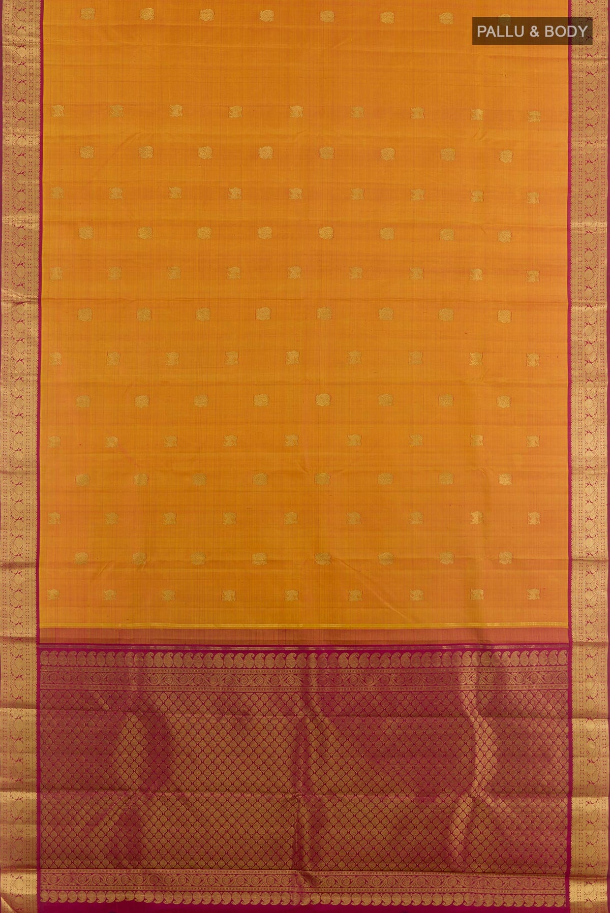 Flat view of Mustard Kanjivaram Silk Saree with Zari Butta on the body and Zari Border. 