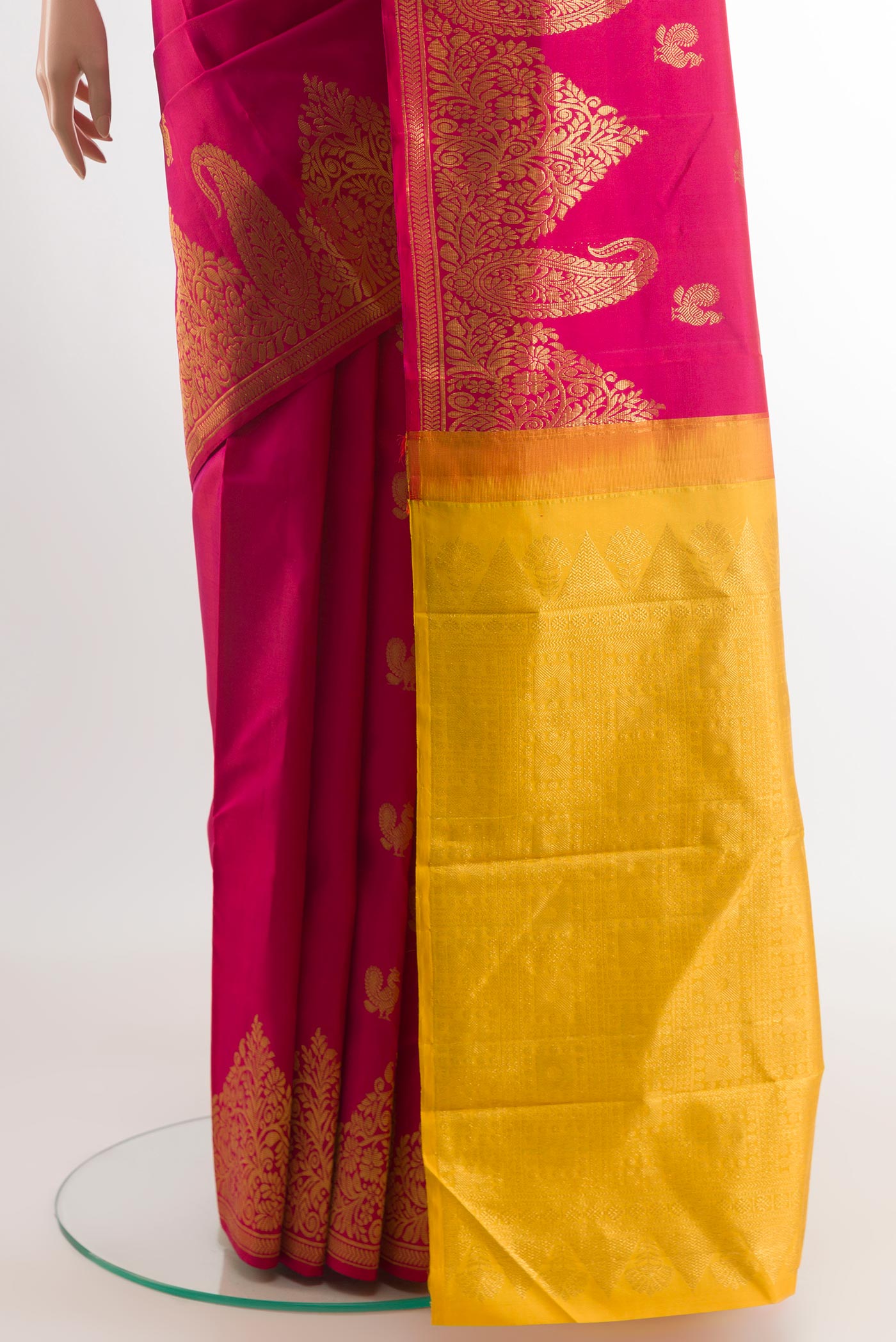 Pleats and pallu of Pink Kanjivaram Silk Saree with Zari Butta on the body and Zari Border. 
