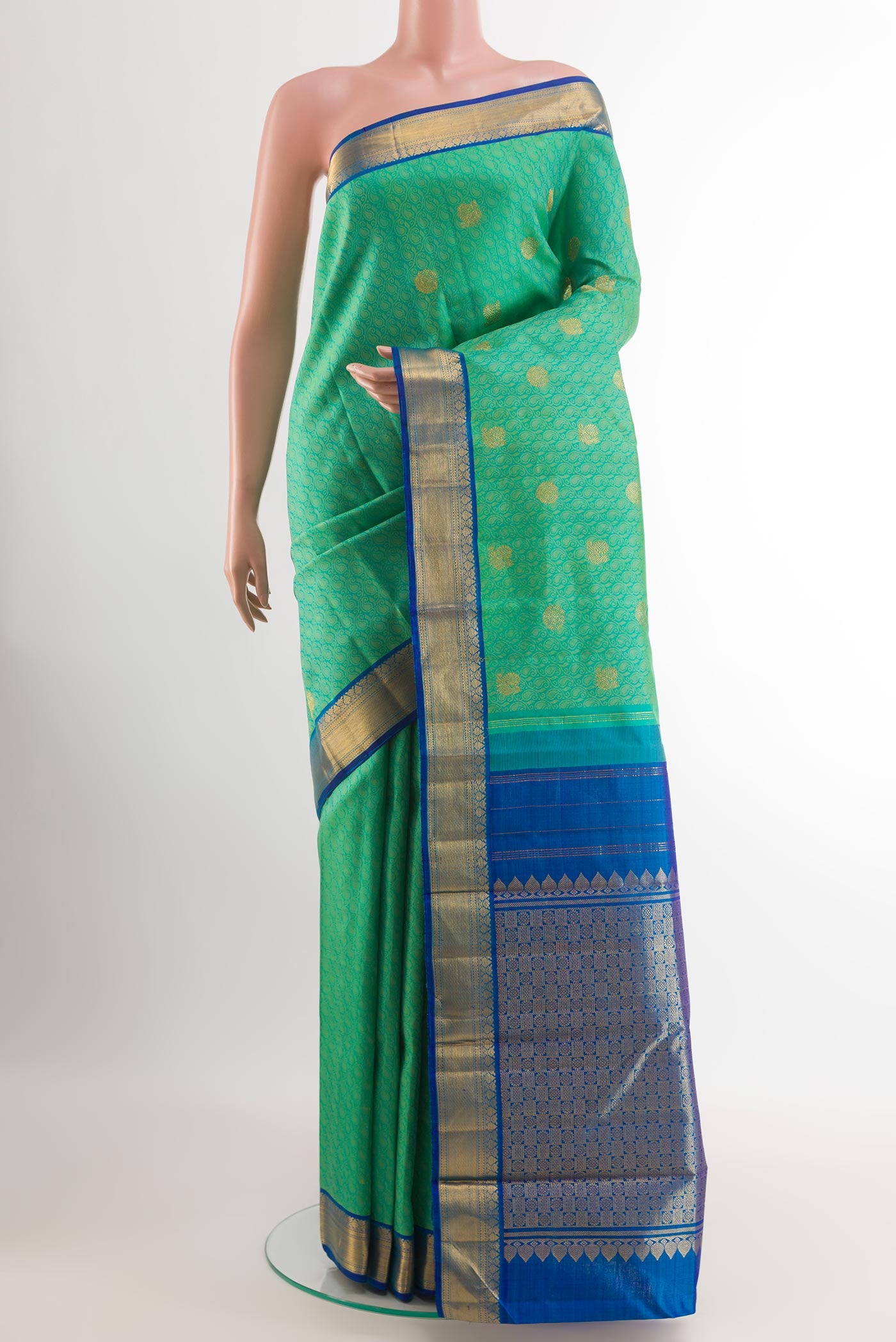 Sea Green Kanjivaram Silk Saree with Jacquard With Zari Butta on the body and Zari Border.  displayed on a mannequin