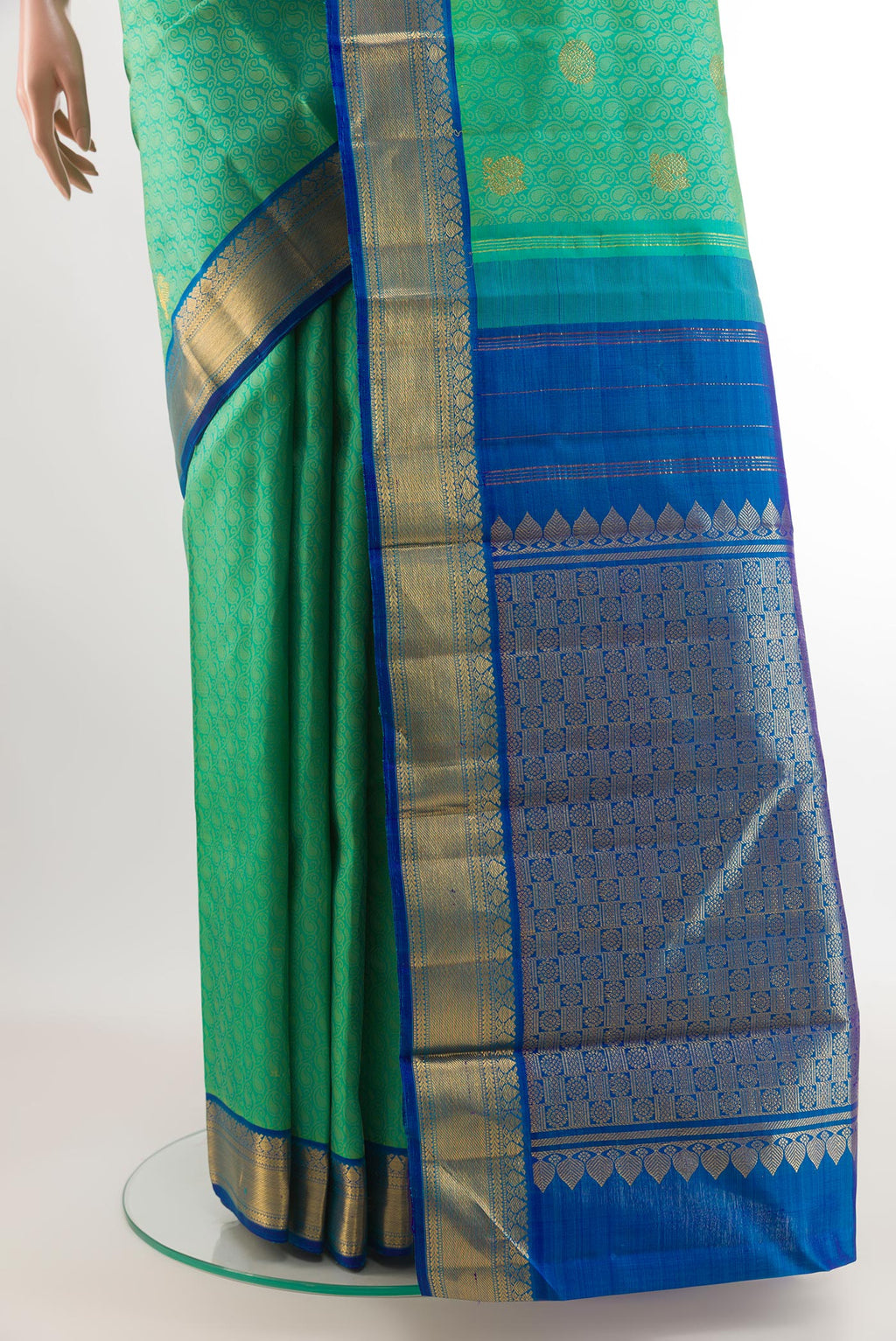 Pleats and pallu of Sea Green Kanjivaram Silk Saree with Jacquard With Zari Butta on the body and Zari Border. 
