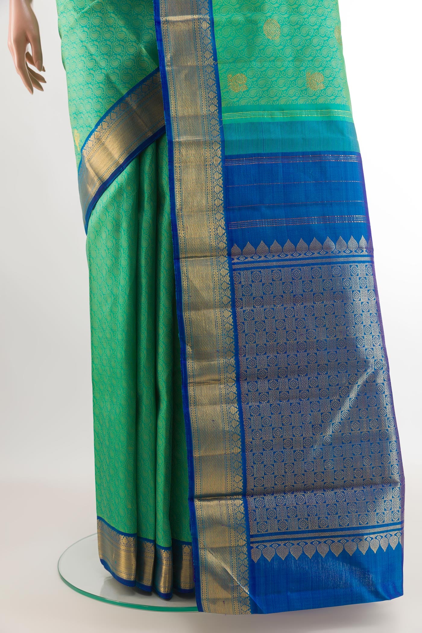 Pleats and pallu of Sea Green Kanjivaram Silk Saree with Jacquard With Zari Butta on the body and Zari Border. 