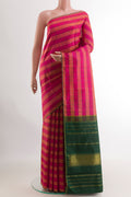 Pink Kanchipuram Silk Saree with Checked design on the body and Zari Border.  displayed on a mannequin