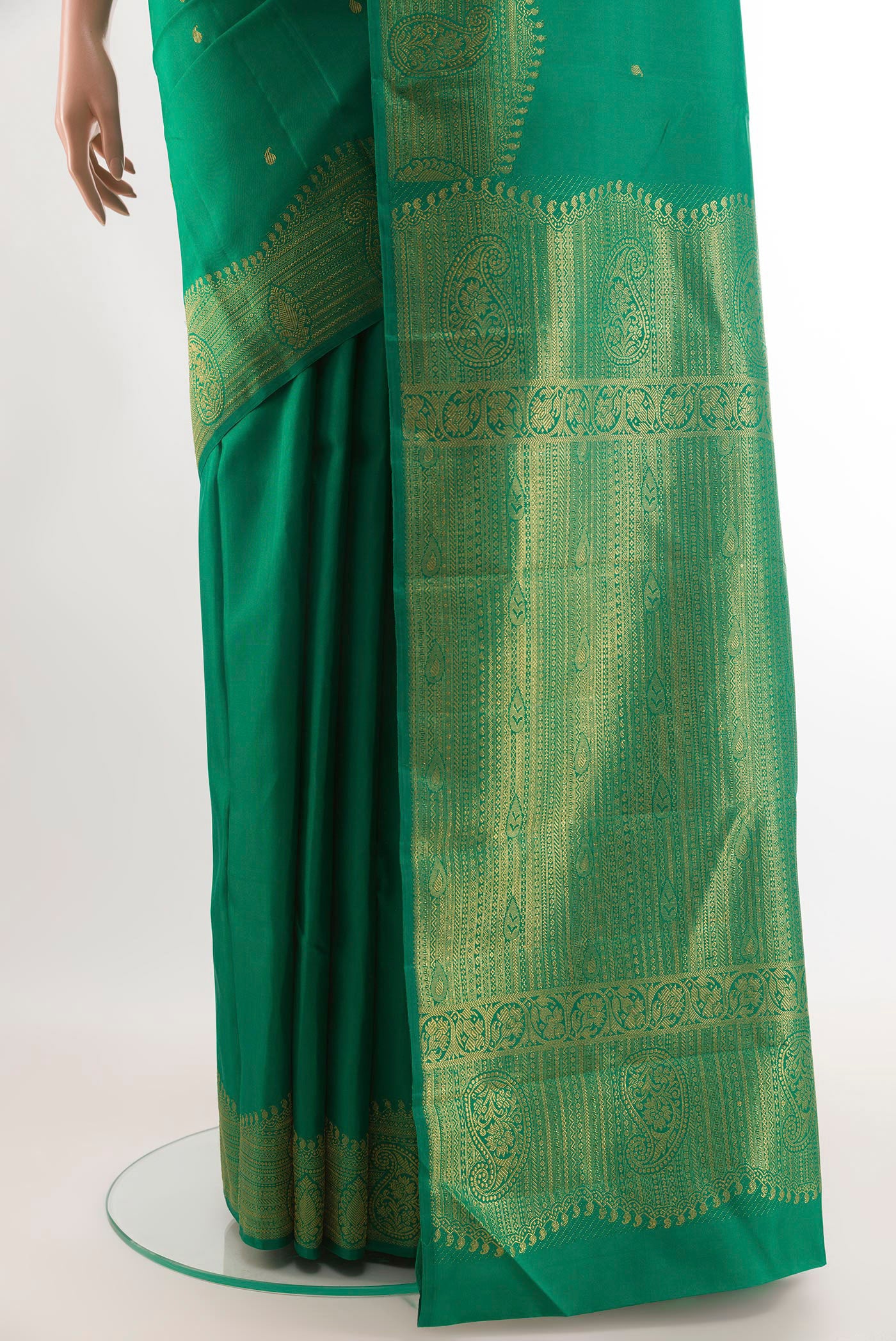 Pleats and pallu of Green Kanjivaram Silk Saree with Zari Butta on the body and Zari Border. 