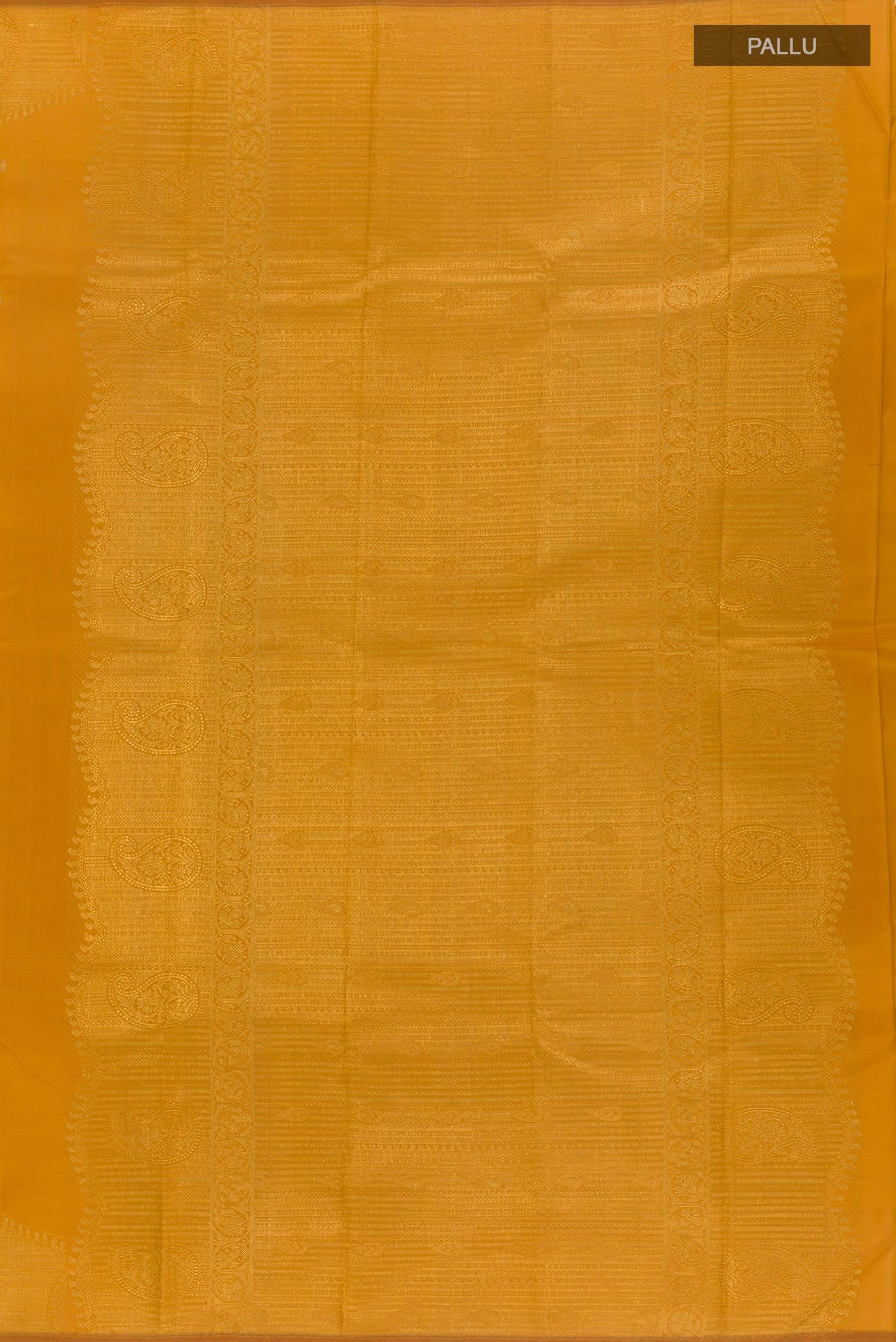 Close up image of the pallu of Mustard Kanjivaram Silk Saree with Zari Butta on the body and Zari Border. 