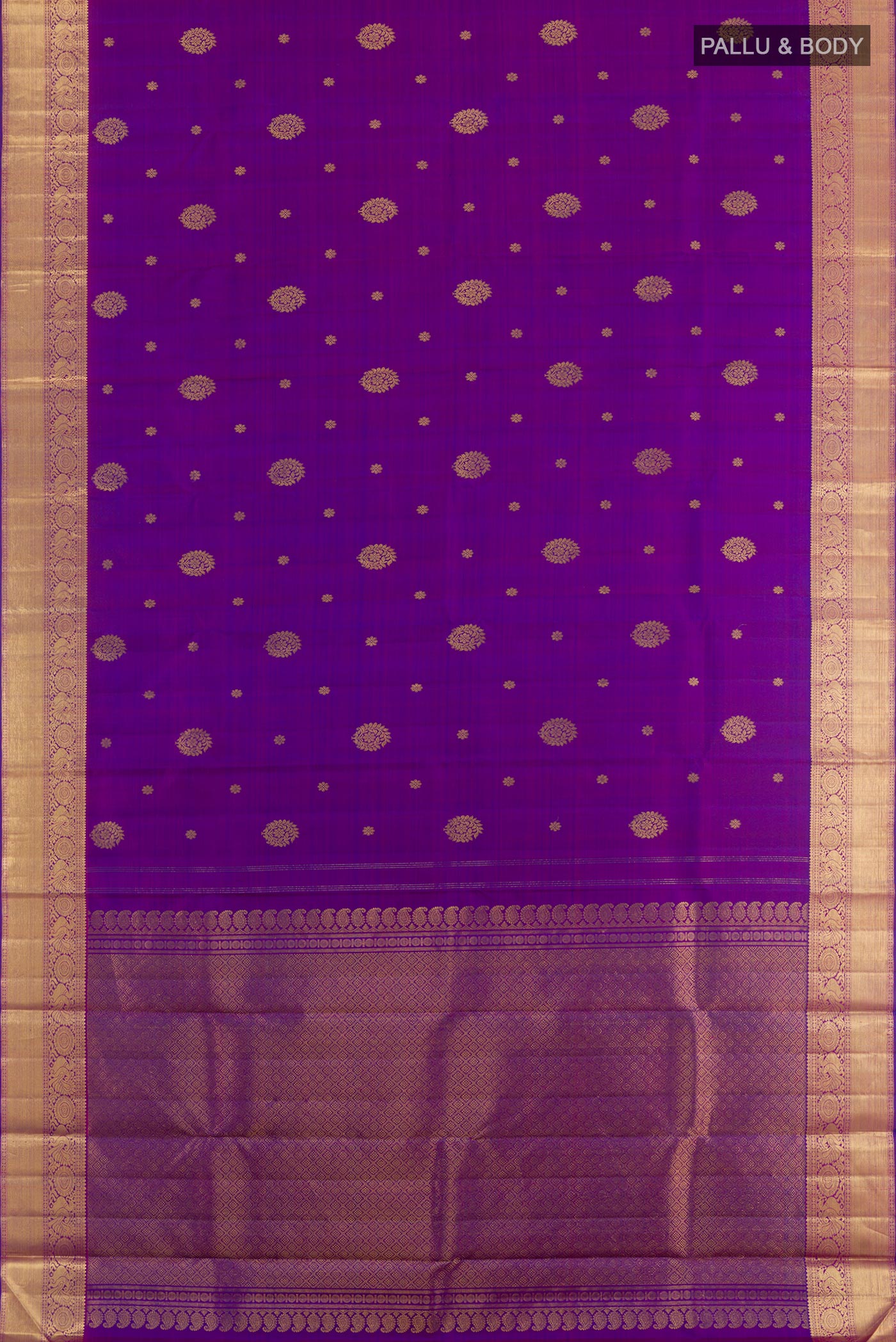 Flat view of Purple Kanjivaram Silk Saree with Zari Butta on the body and Zari Border. 