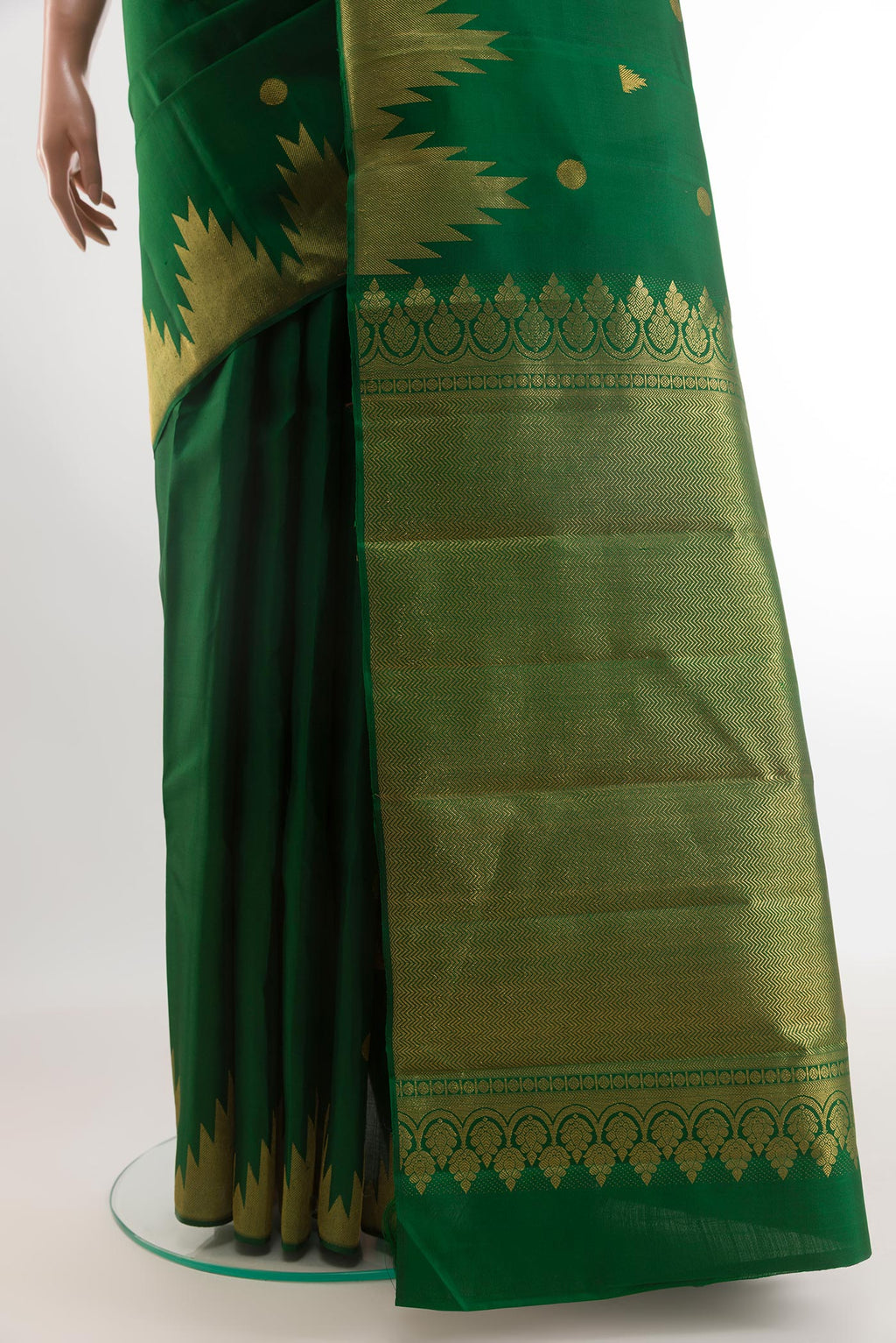 Pleats and pallu of Green Kanjivaram Silk Saree with Zari Butta on the body and Zari Border. 