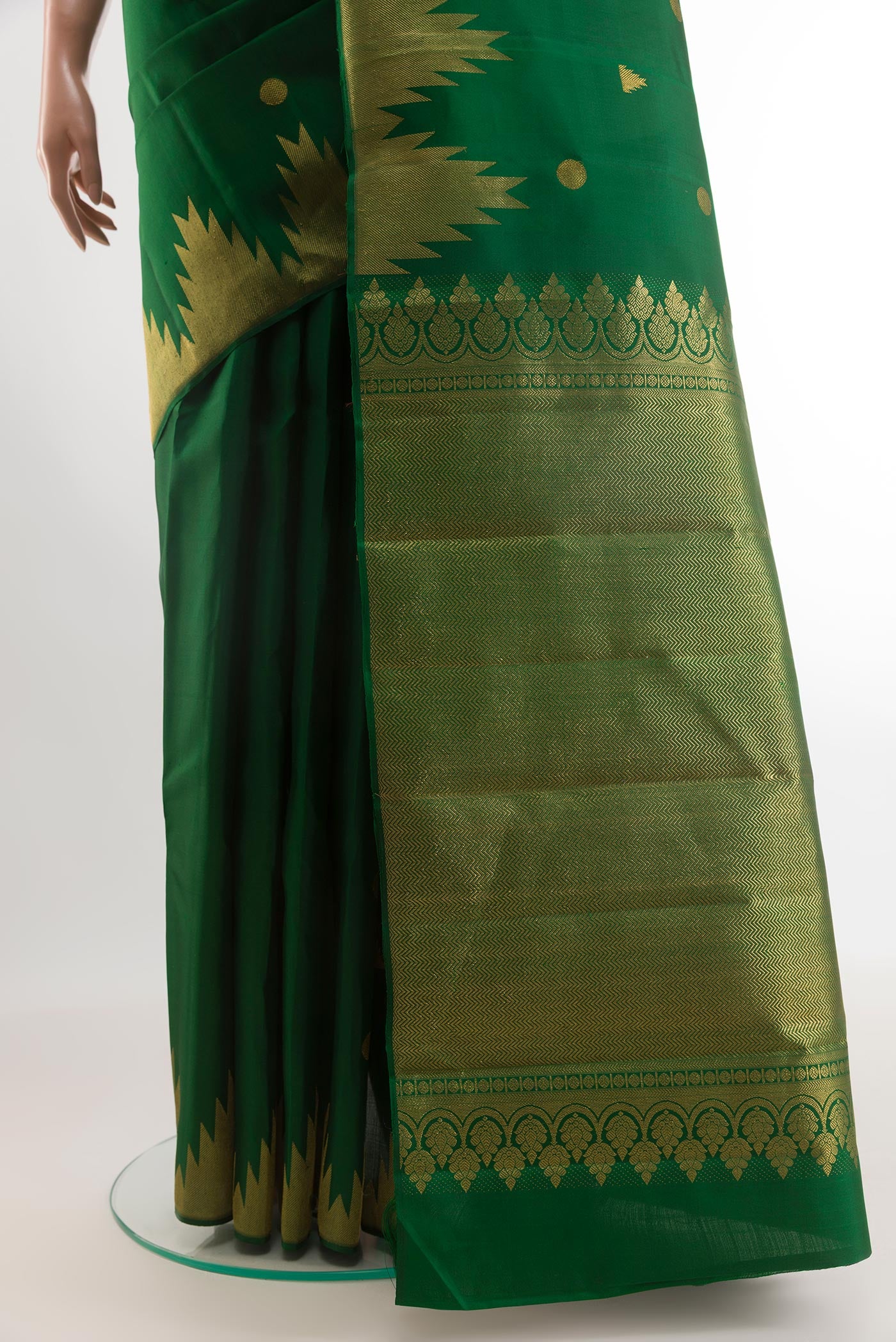 Pleats and pallu of Green Kanjivaram Silk Saree with Zari Butta on the body and Zari Border. 