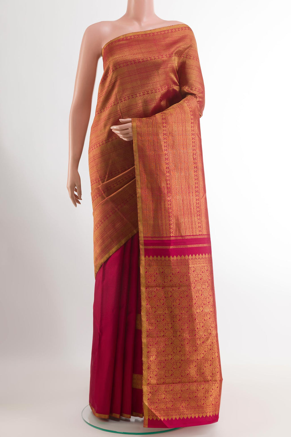 Maroon Kanjivaram Silk Saree with Zari Brocade on the body and Zari Border.  displayed on a mannequin