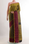 Black Kanjivaram Silk Saree with Zari Brocade on the body and Ganga Jamuna Border.  displayed on a mannequin