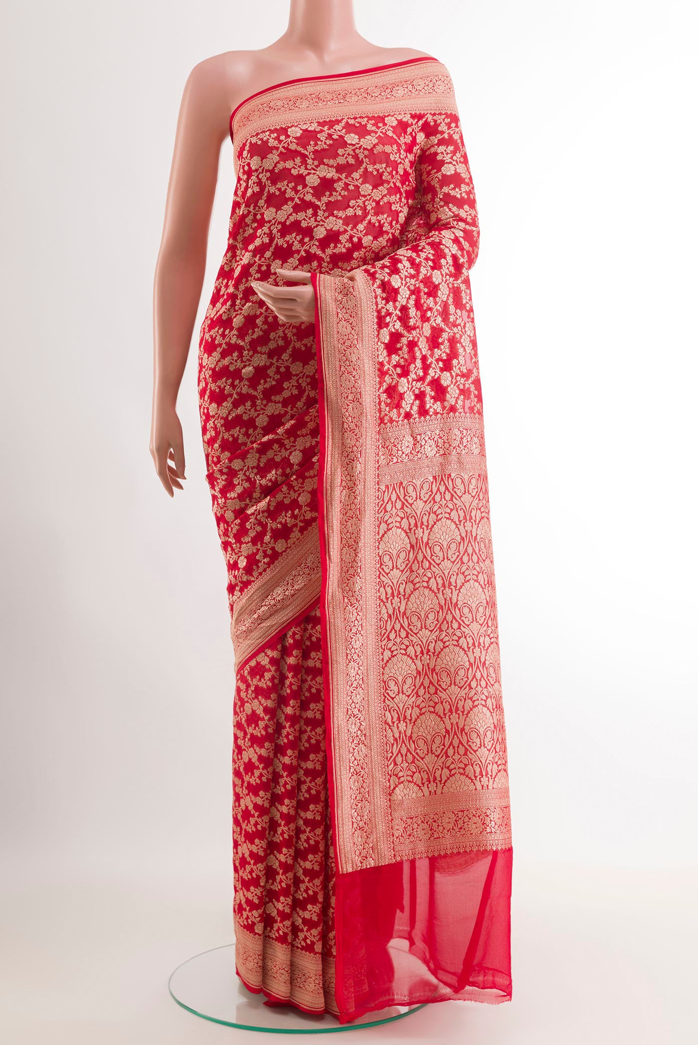 Red Banarasi Georgette Saree with Zari Brocade on the body and Zari Border.  displayed on a mannequin