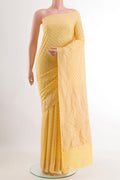 Yellow Banarasi Georgette Saree with Zari Butta on the body and Zari Border.  displayed on a mannequin