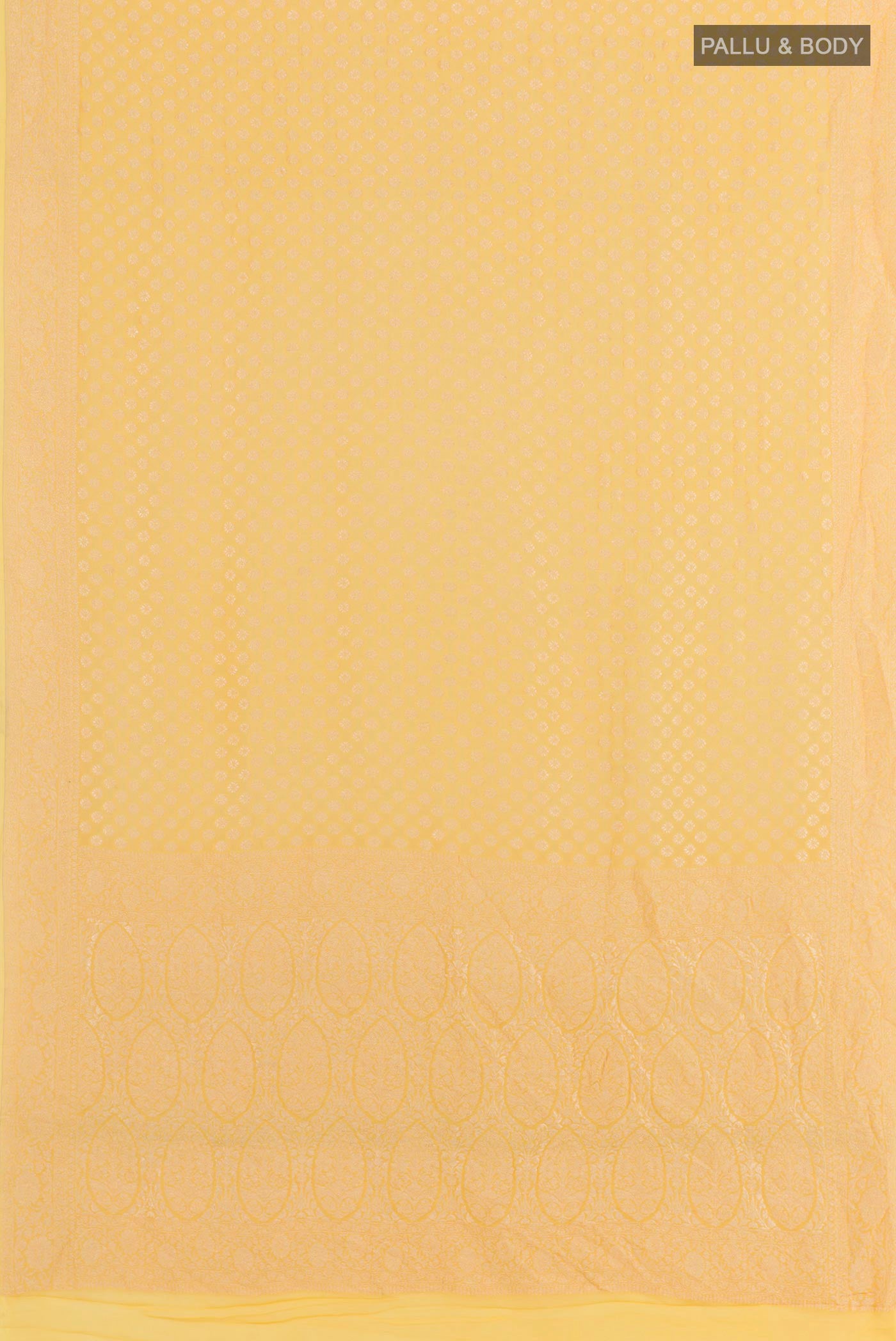 Flat view of Yellow Banarasi Georgette Saree with Zari Butta on the body and Zari Border. 