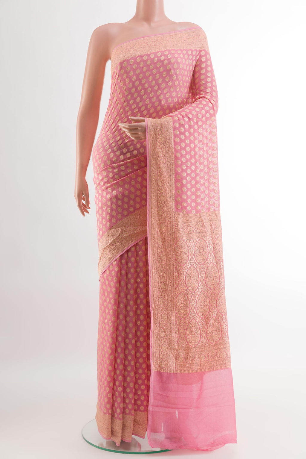 Rose pink Banarasi Georgette Saree with Zari Butta on the body and Zari Border.  displayed on a mannequin