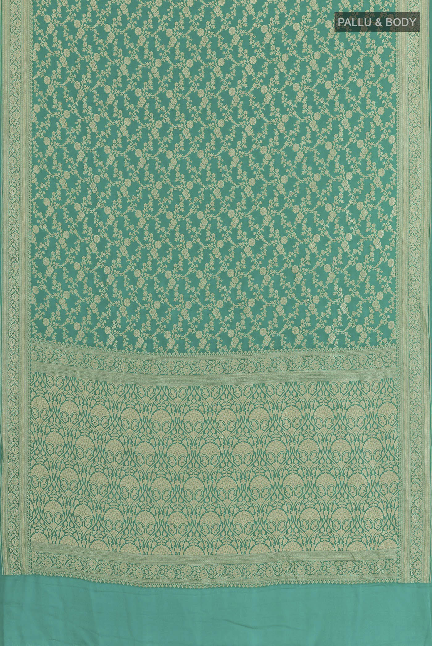 Flat view of Sea Green Banarasi Georgette Saree with Zari Brocade on the body and Zari Border. 