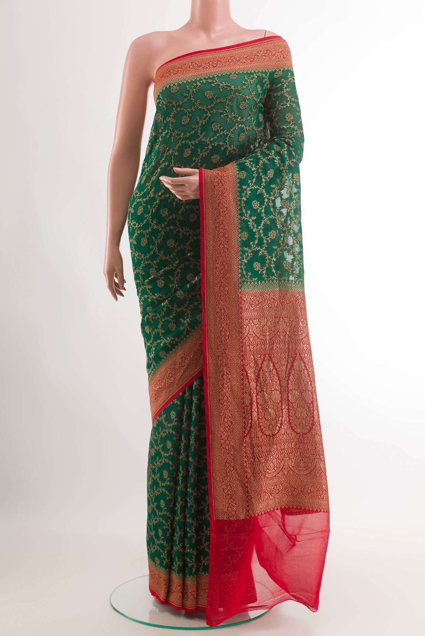 Green Banarasi Georgette Saree with Zari Brocade on the body and Paithani Border.  displayed on a mannequin