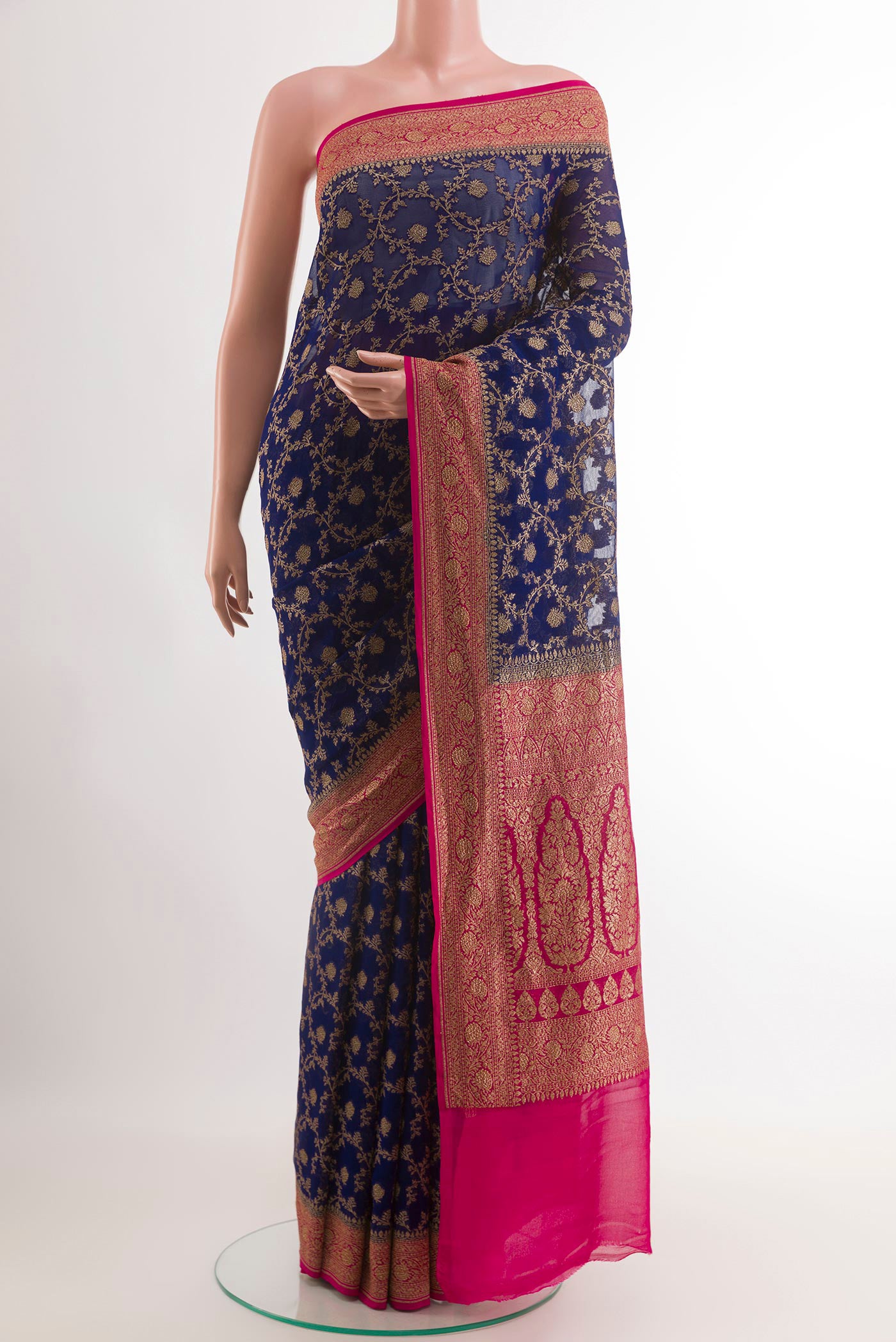 Blue Banarasi Georgette Saree with Zari Brocade on the body and Paithani Border.  displayed on a mannequin