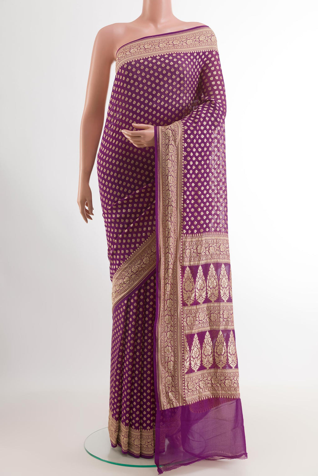 Purple Banarasi Georgette Saree with Zari Butta on the body and Zari Border.  displayed on a mannequin