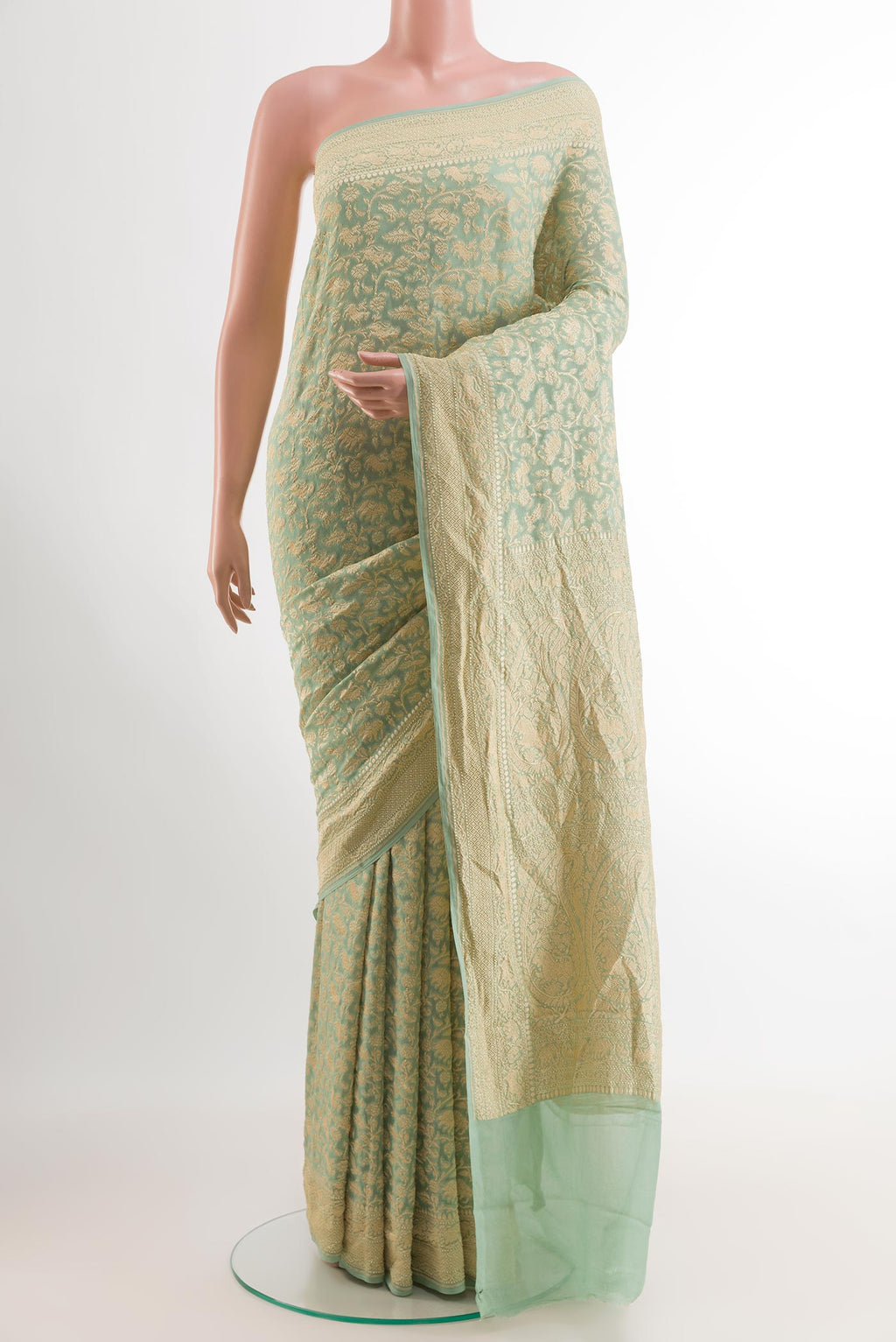 Blue Banarasi Georgette Saree with Zari Brocade on the body and Zari Border.  displayed on a mannequin