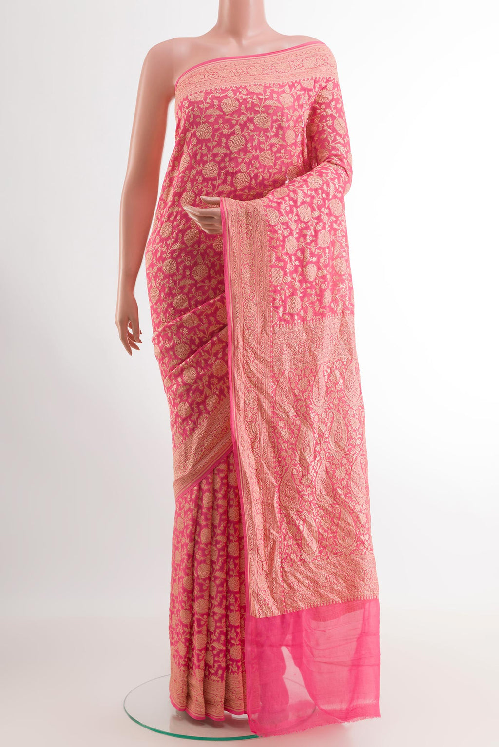 Pink Banarasi Georgette Saree with Zari Brocade on the body and Zari Border.  displayed on a mannequin