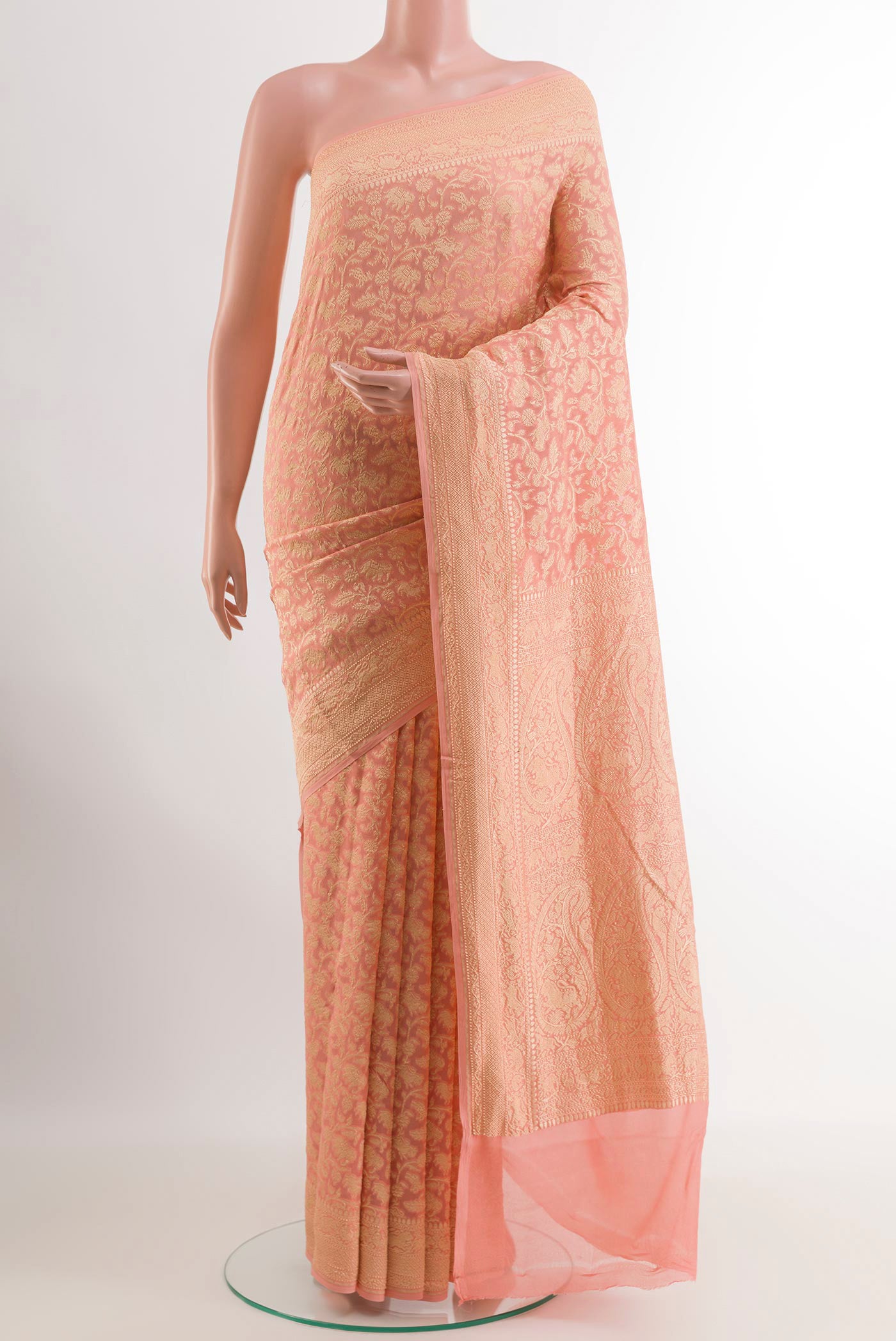 Rose pink Banarasi Georgette Saree with Zari Brocade on the body and Zari Border.  displayed on a mannequin