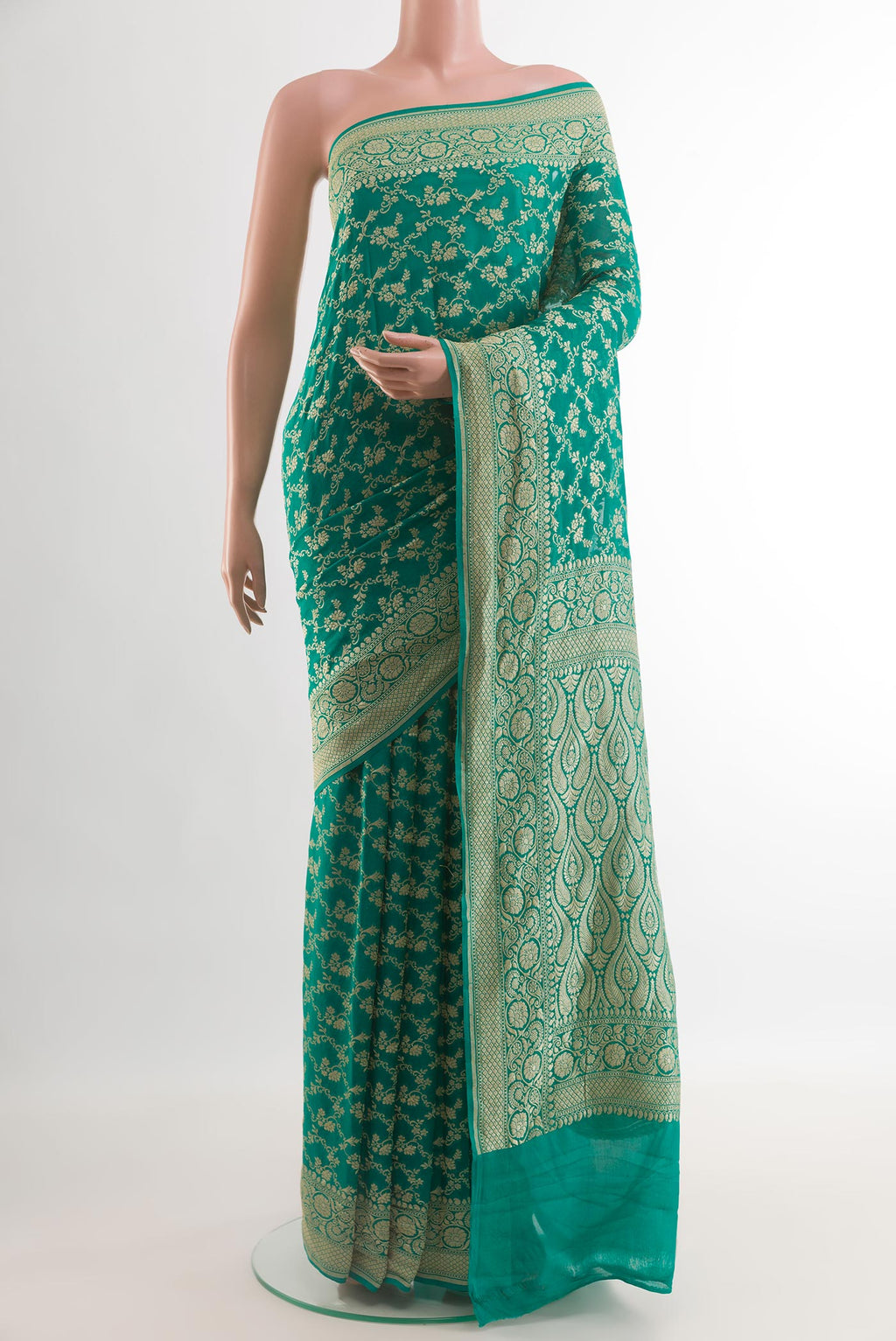 Sea Green Banarasi Georgette Saree with Zari Brocade on the body and Zari Border.  displayed on a mannequin