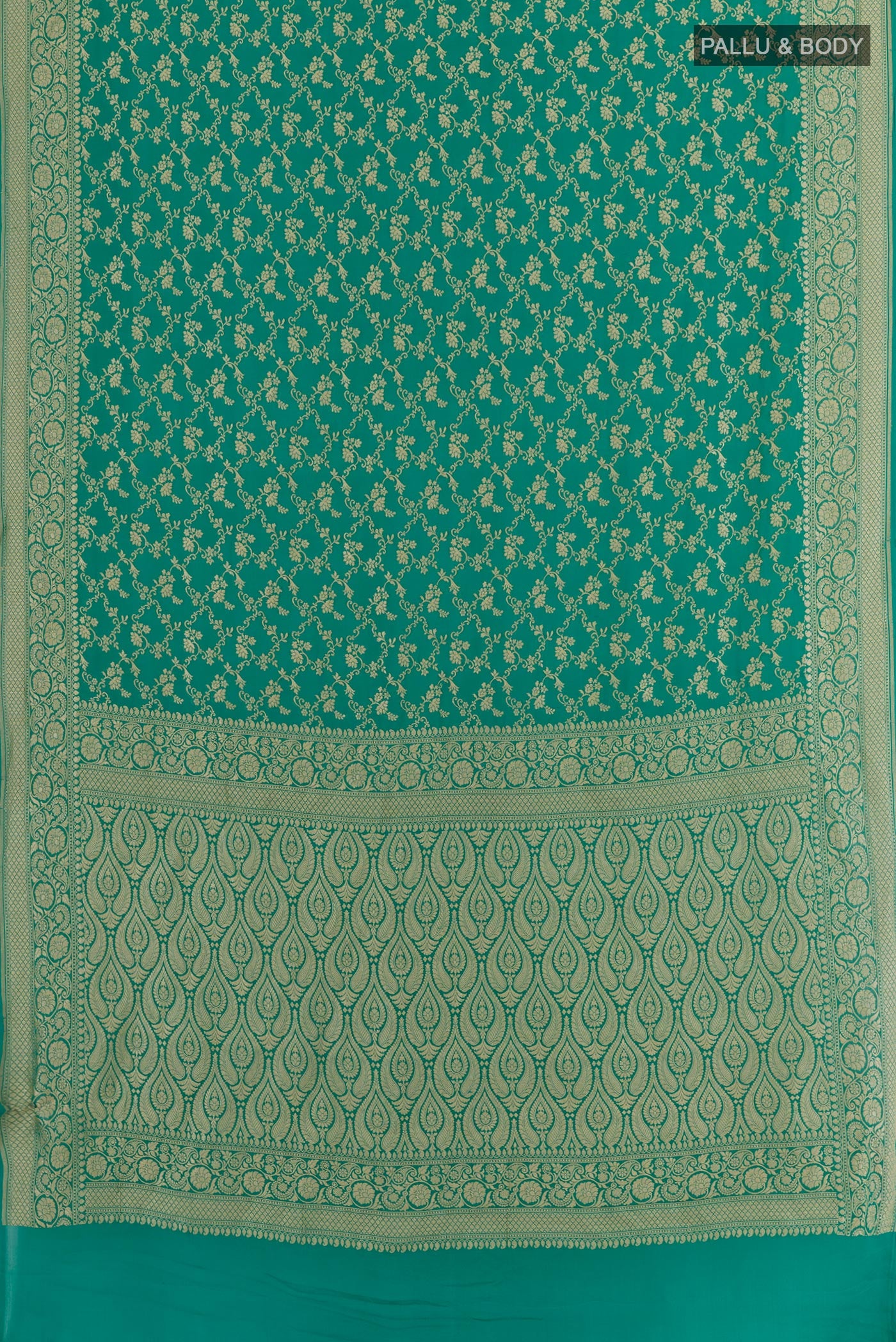 Flat view of Sea Green Banarasi Georgette Saree with Zari Brocade on the body and Zari Border. 