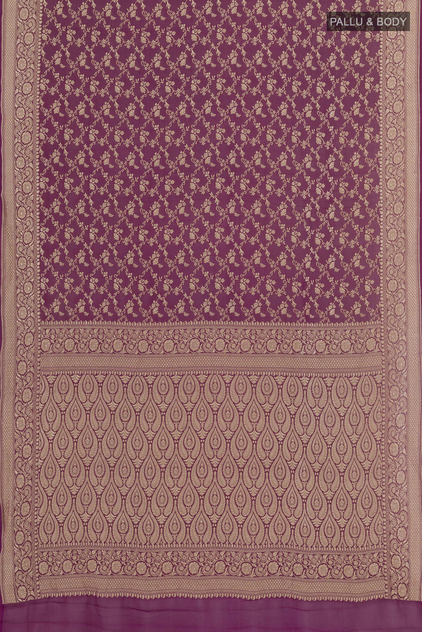 Flat view of Purple Banarasi Georgette Saree with Zari Brocade on the body and Zari Border. 