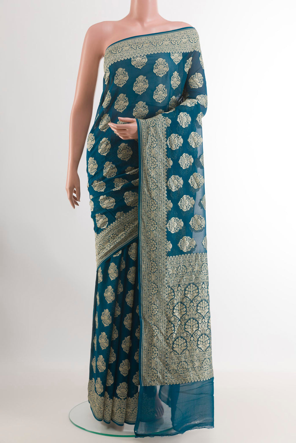 Blue Banarasi Georgette Saree with Zari Butta on the body and Zari Border.  displayed on a mannequin