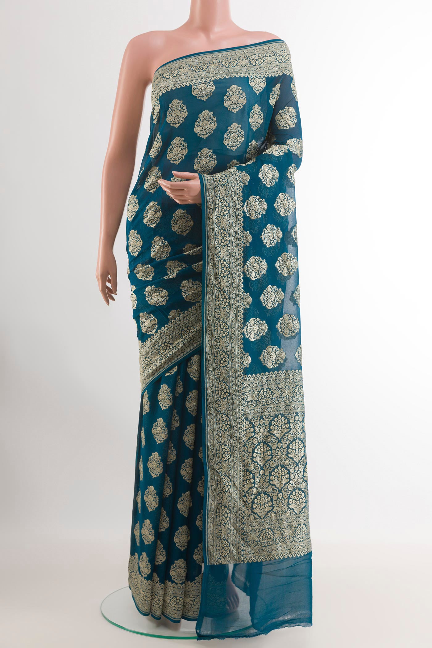 Blue Banarasi Georgette Saree with Zari Butta on the body and Zari Border.  displayed on a mannequin