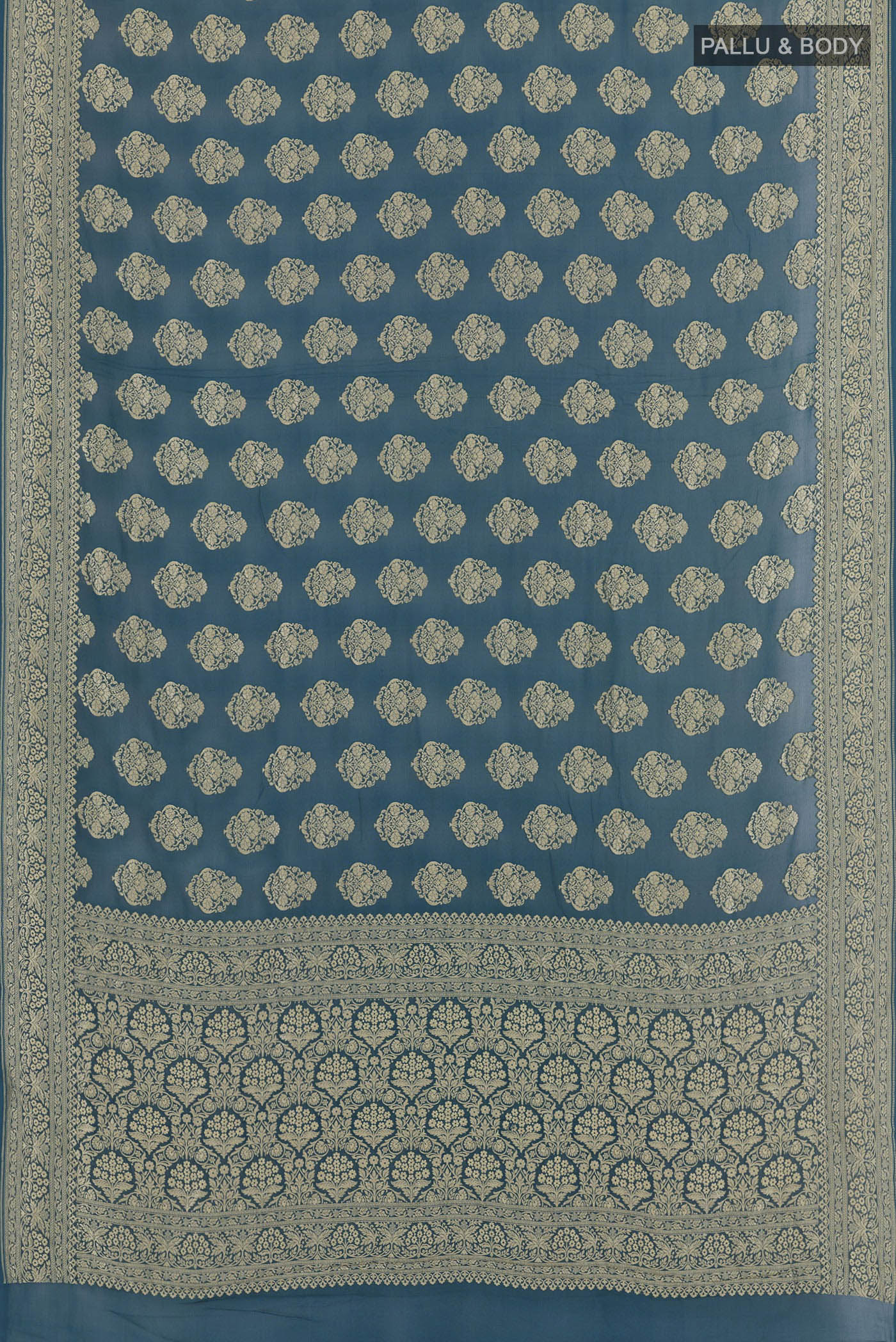 Flat view of Blue Banarasi Georgette Saree with Zari Butta on the body and Zari Border. 