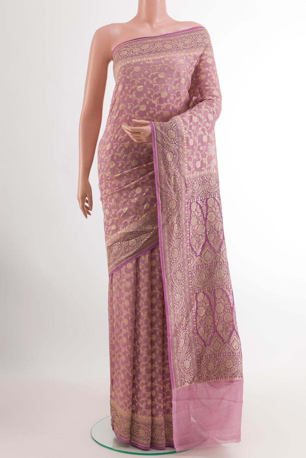 Lavender Banarasi Georgette Saree with Zari Brocade on the body and Thread Border.  displayed on a mannequin